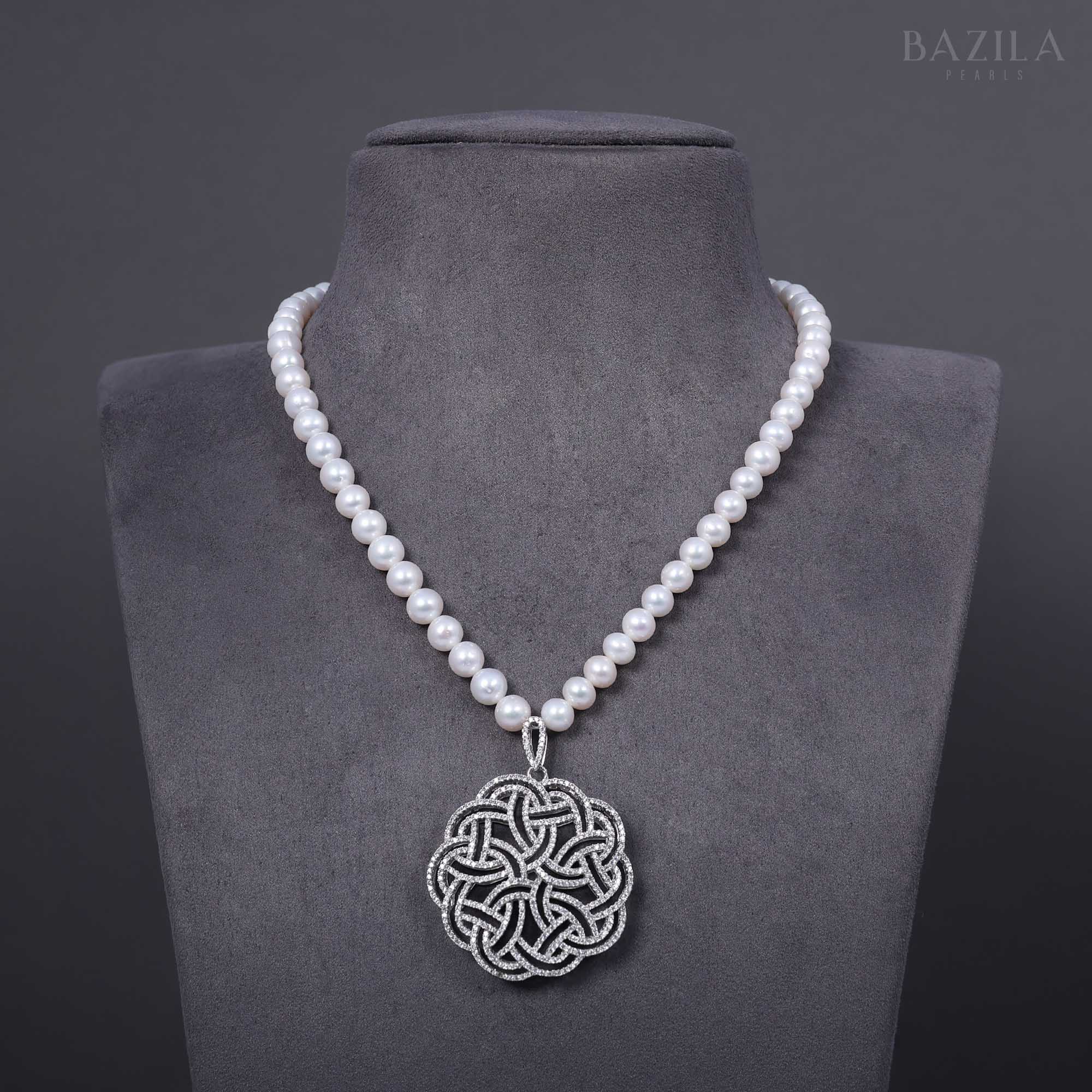Elegant Pearl Necklace with Intricate Zircon Knot Pendant