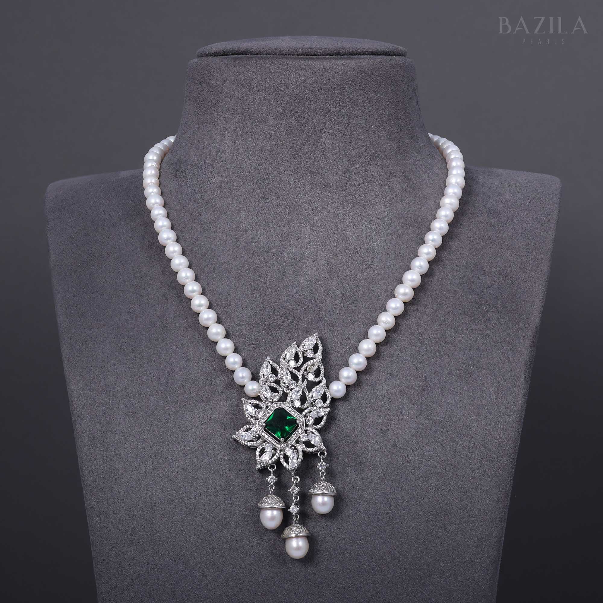 Elegant Pearl Necklace with Emerald and Zircon Floral Pendant