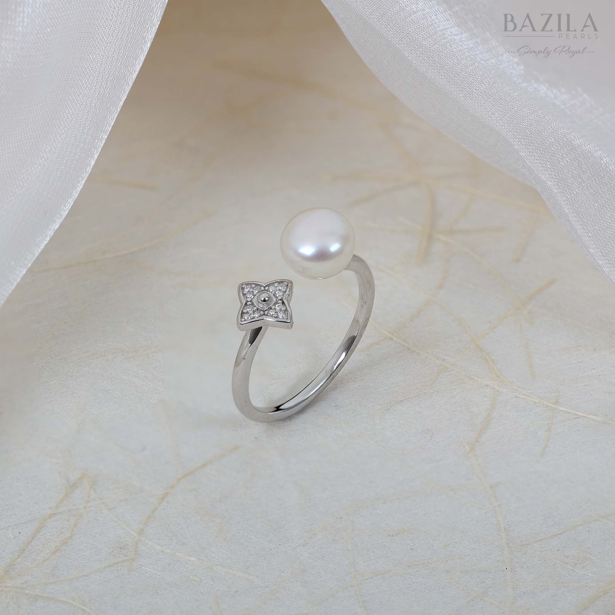 White Pearl Ring with Silver Finish and Floral Accent