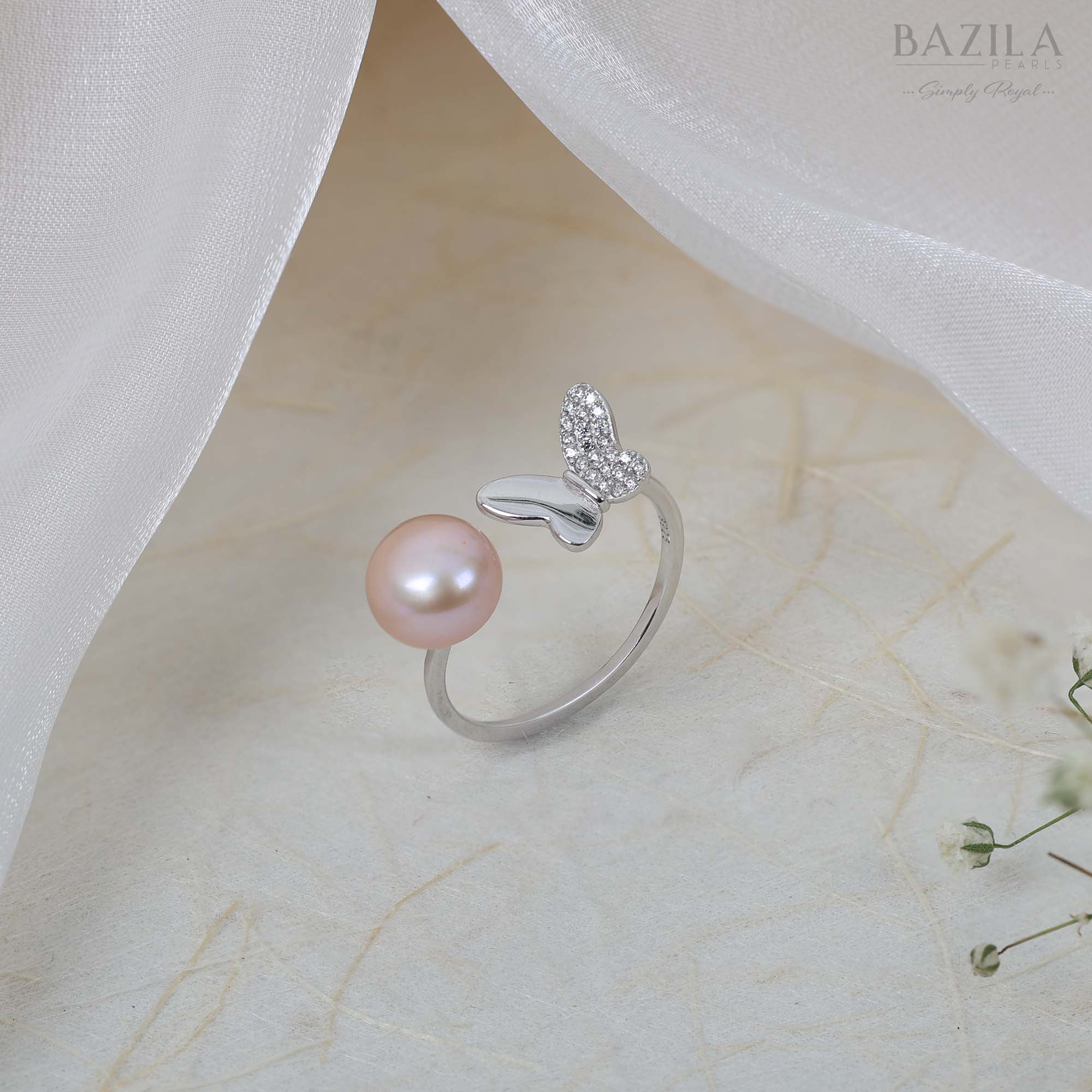 Pink Pearl Ring with Silver Butterfly Accent