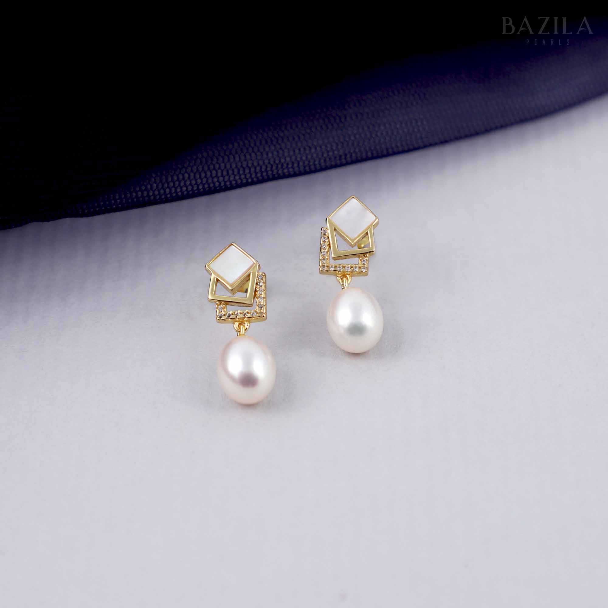 White Drop Pearl Earrings with Gold Geometric and Mother of Pearl Detail