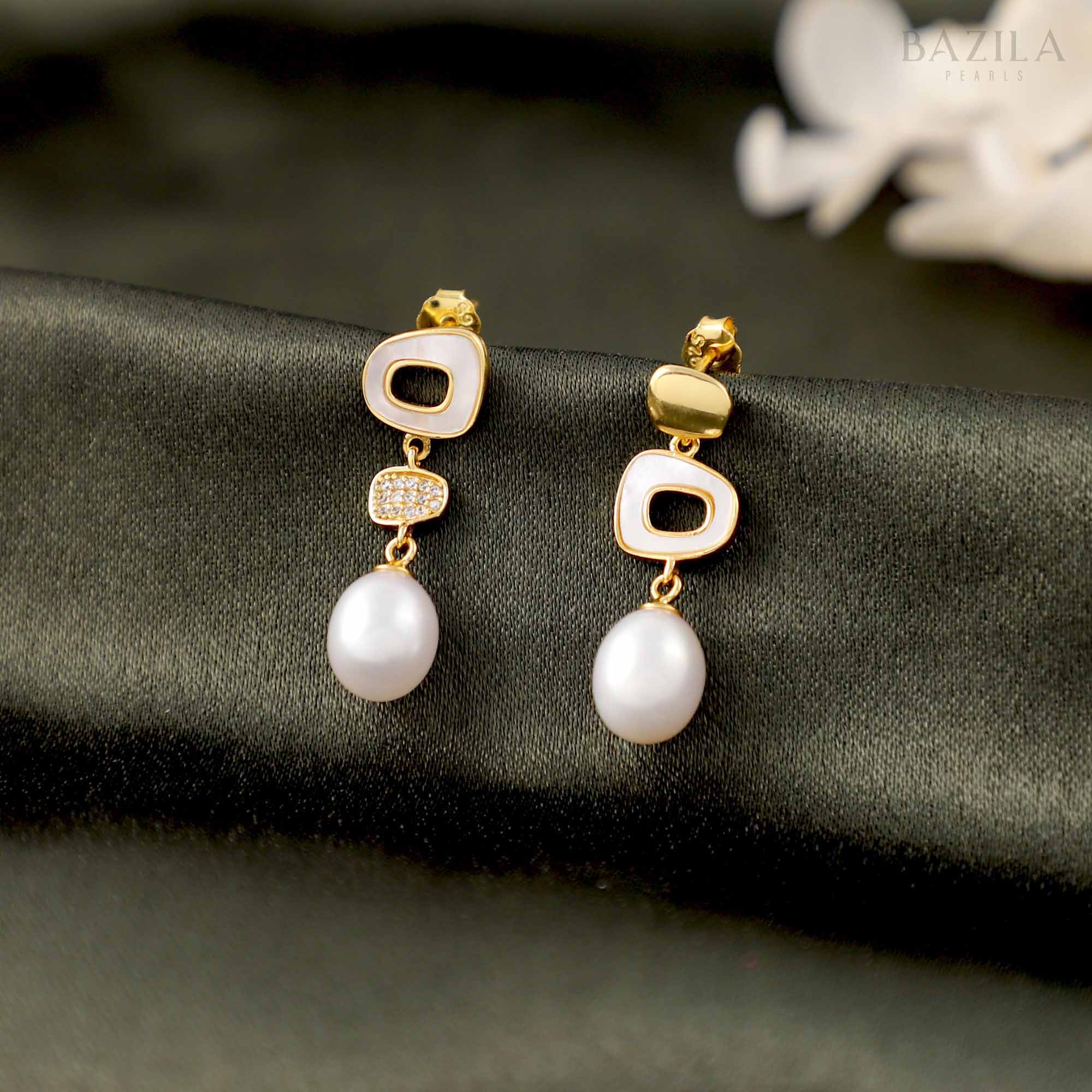 Lustrous White Pearl Drops with Warm Golden Accents