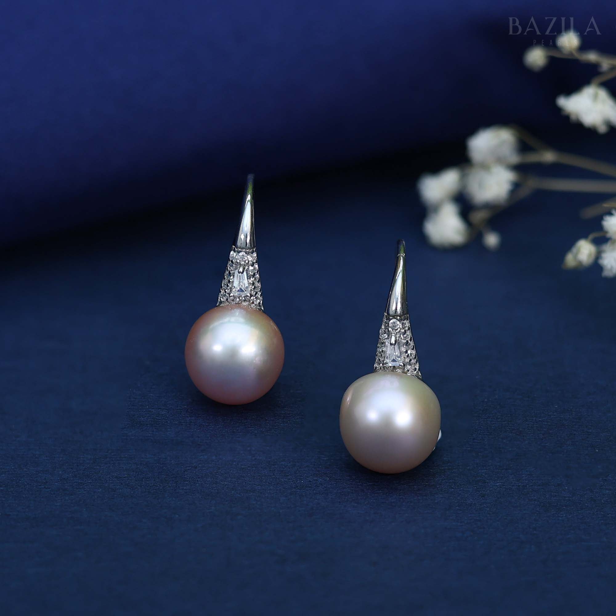 "Elegant Freshwater Pearl Drop Earrings with Sparkling Silver Detailing"