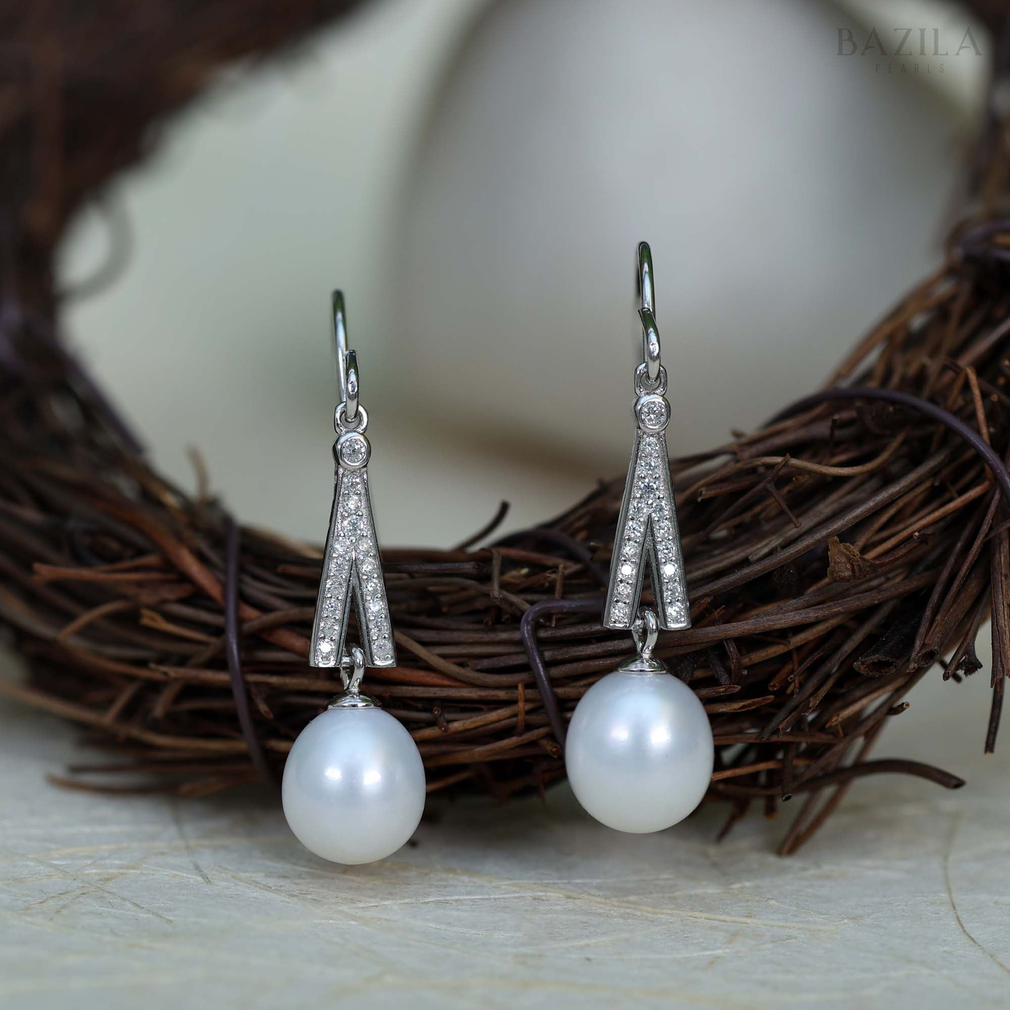 Sophisticated Silver Earrings with Classic White Pearls Designed with Stylish Zircon-Encrusted V-Shaped Drop