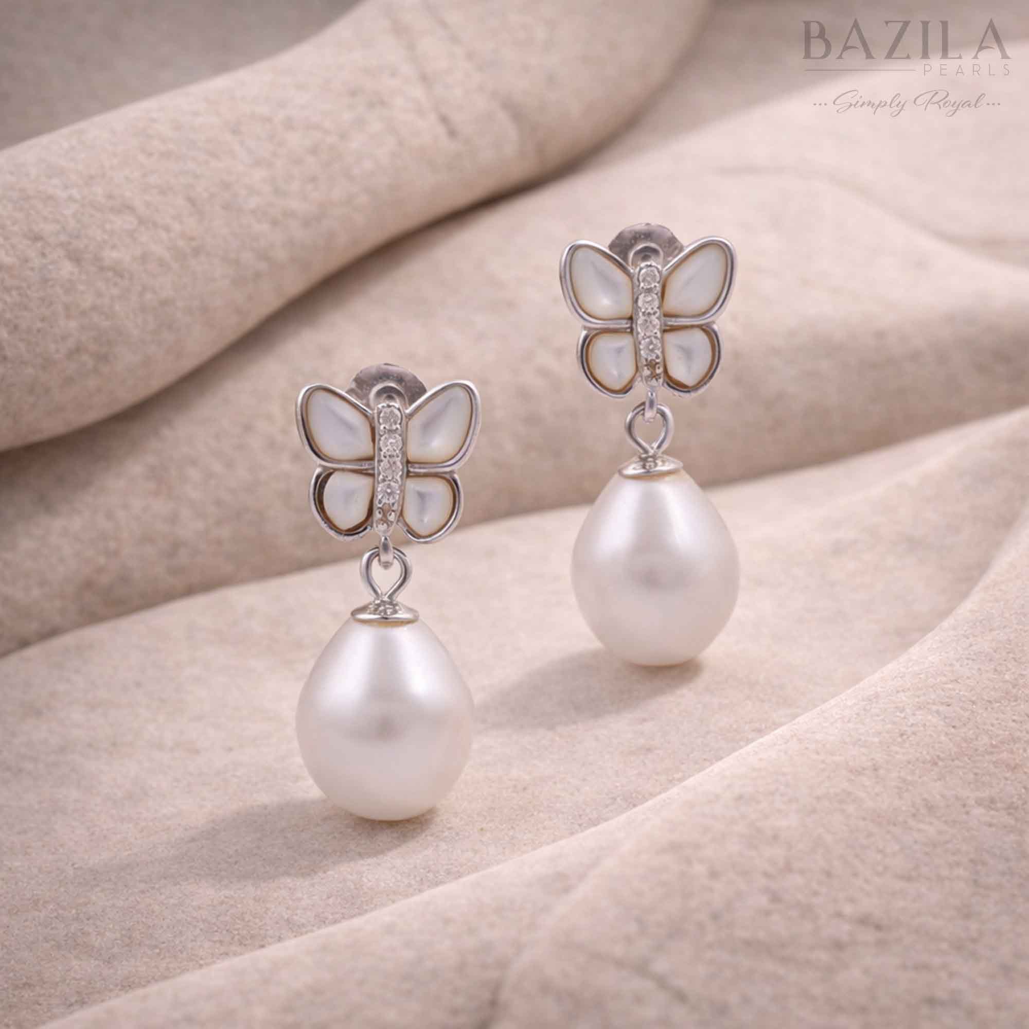 White Fresh Pearl Drop Earrings – Silver Butterfly Design