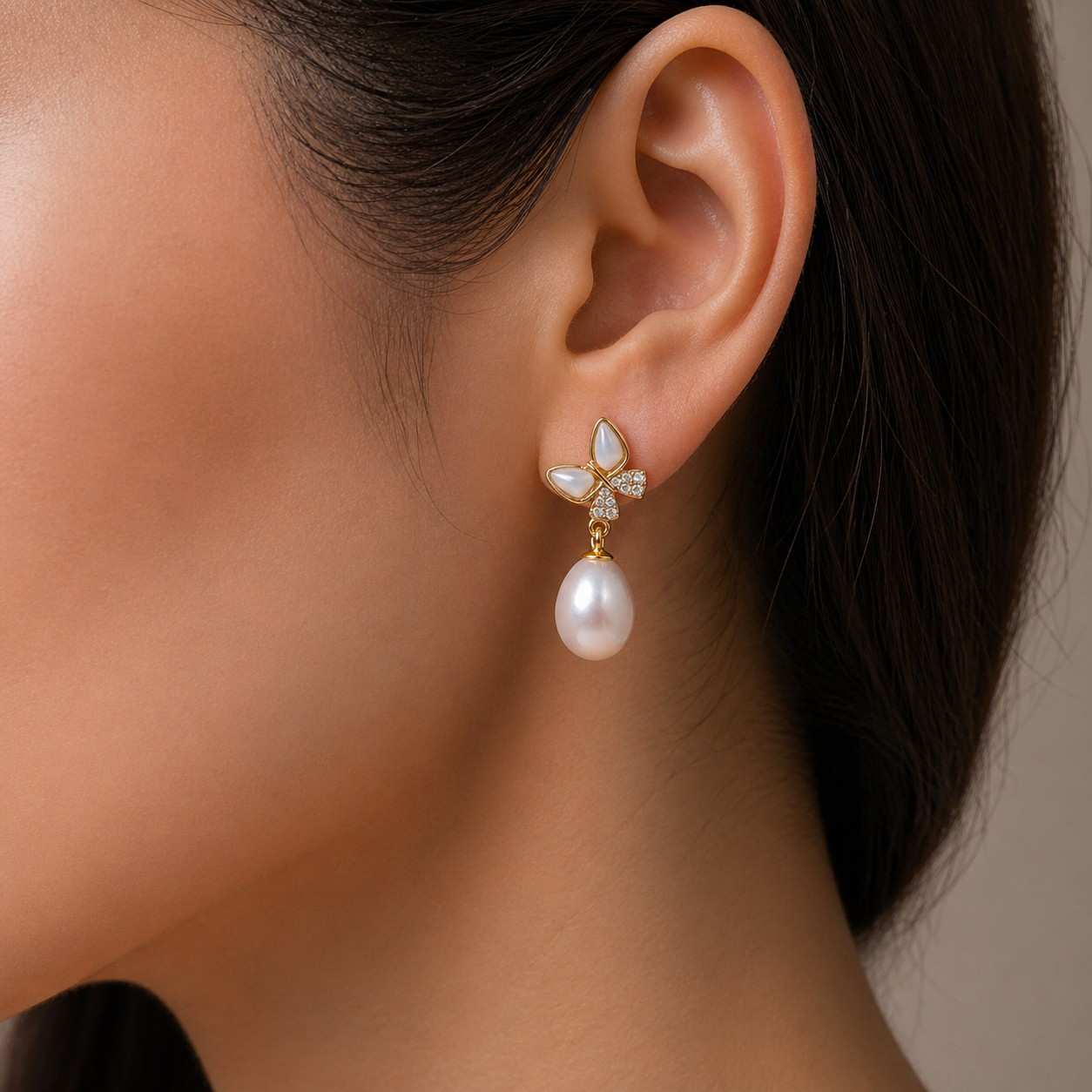 White Pearl Butterfly Drop Earrings in Gold Finish