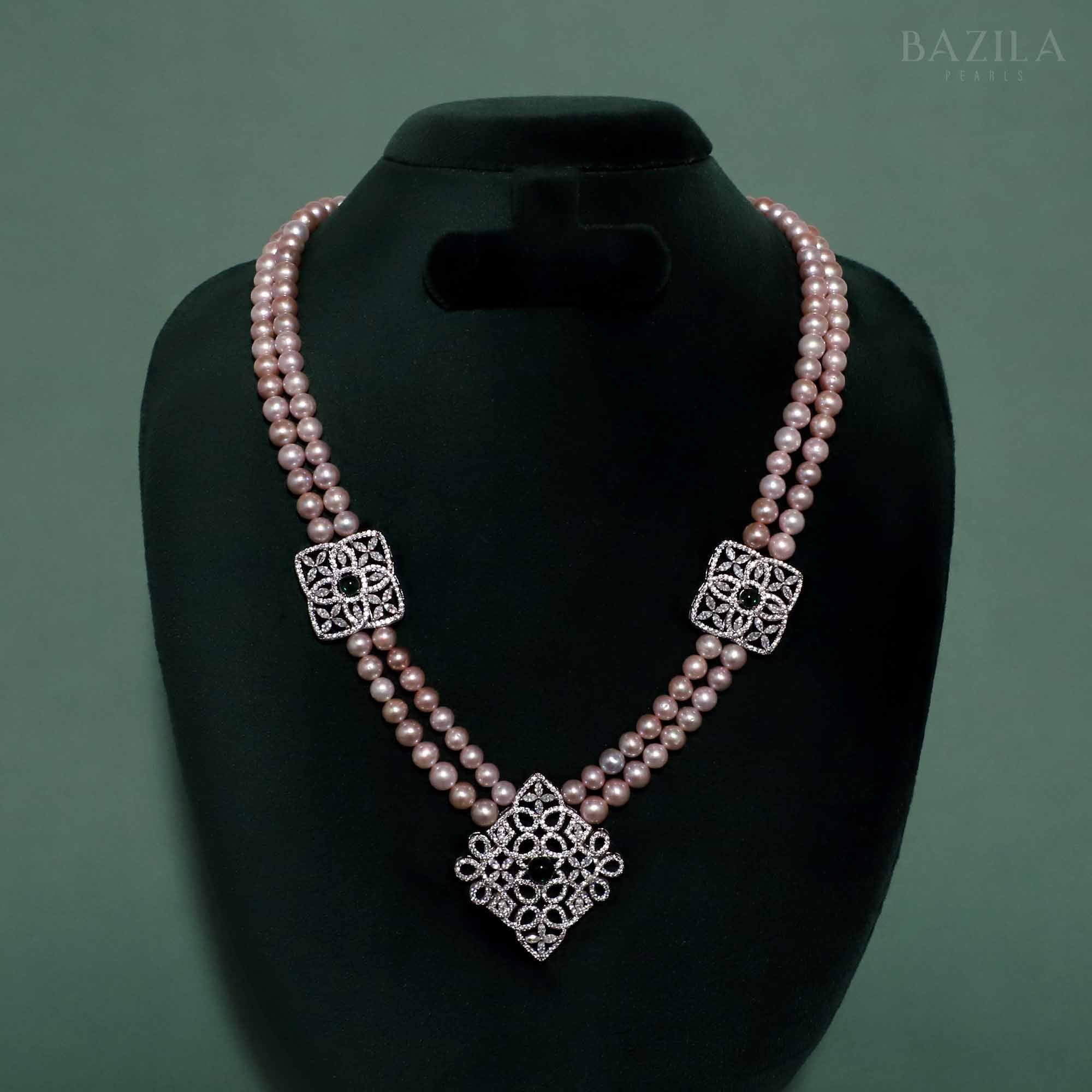 Dual-Strand Mauve Pearl Necklace with Ornate Zircon Accents