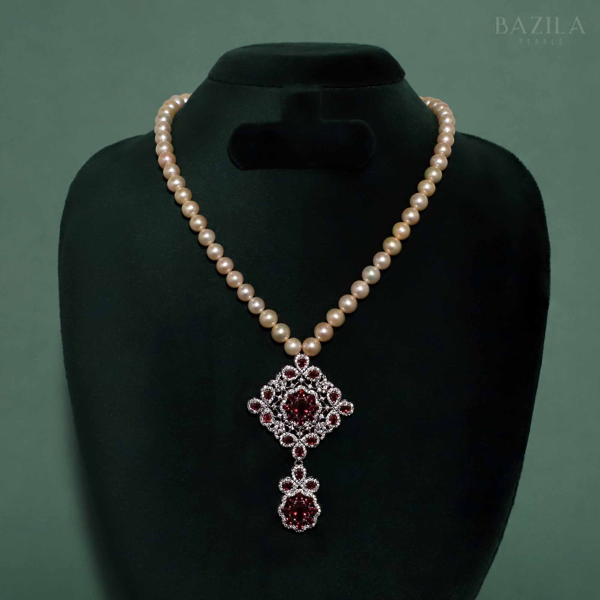 Elegant Pearl Necklace with Ornate Ruby Zircon Pendant