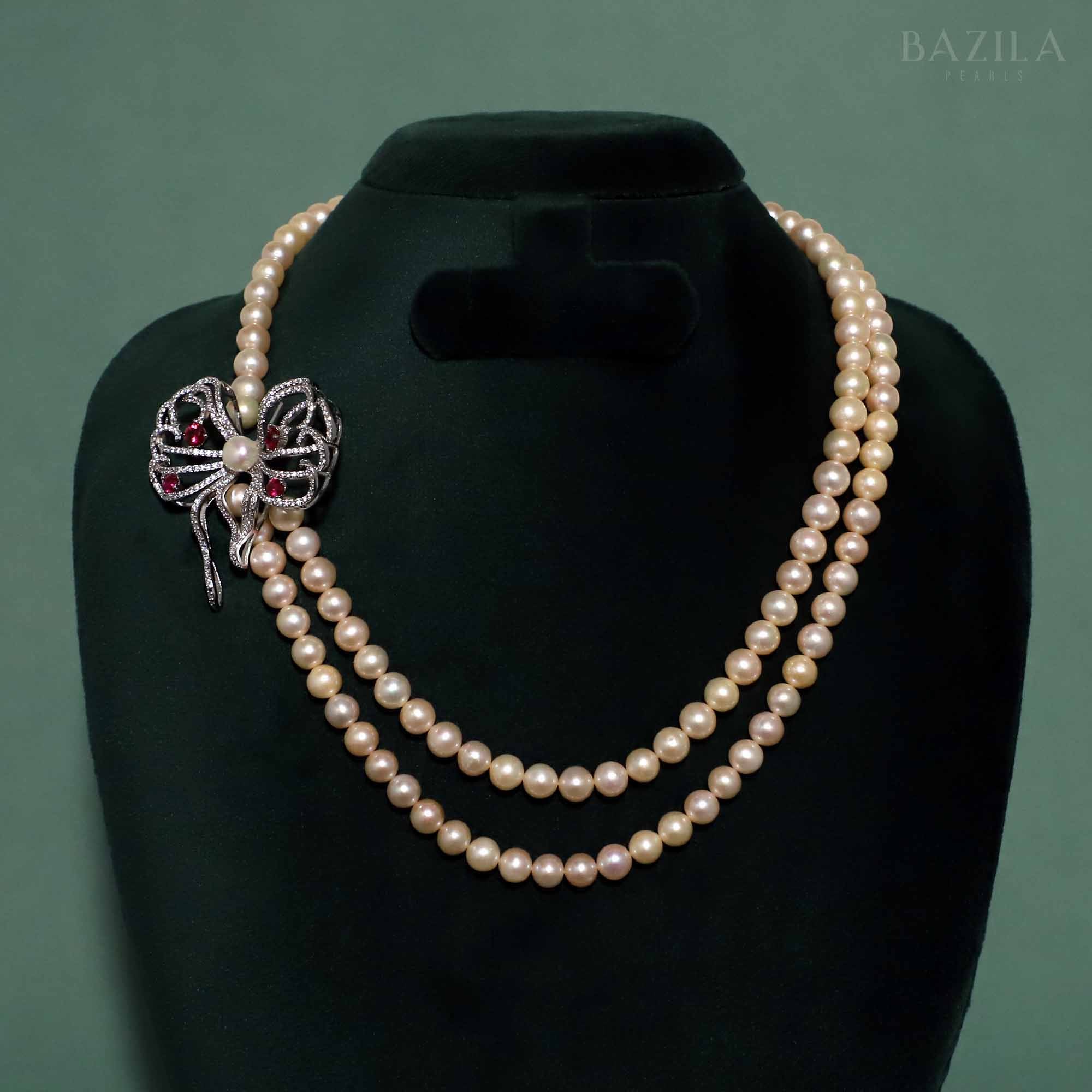 Double-Strand Pearl Necklace with Artistic Bow Accent