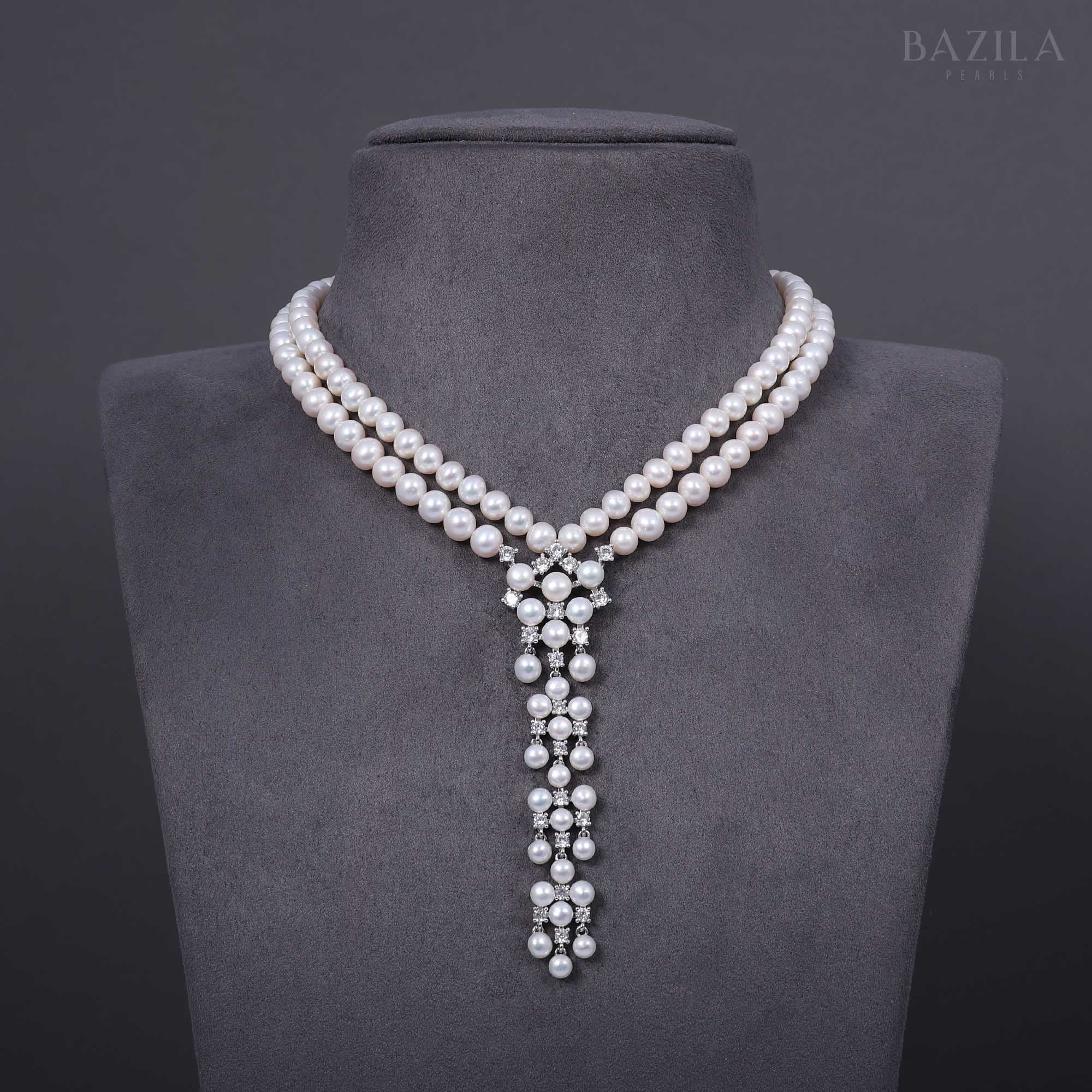 Graceful Pearl Necklace with Flowing Zircon Drop Pendant