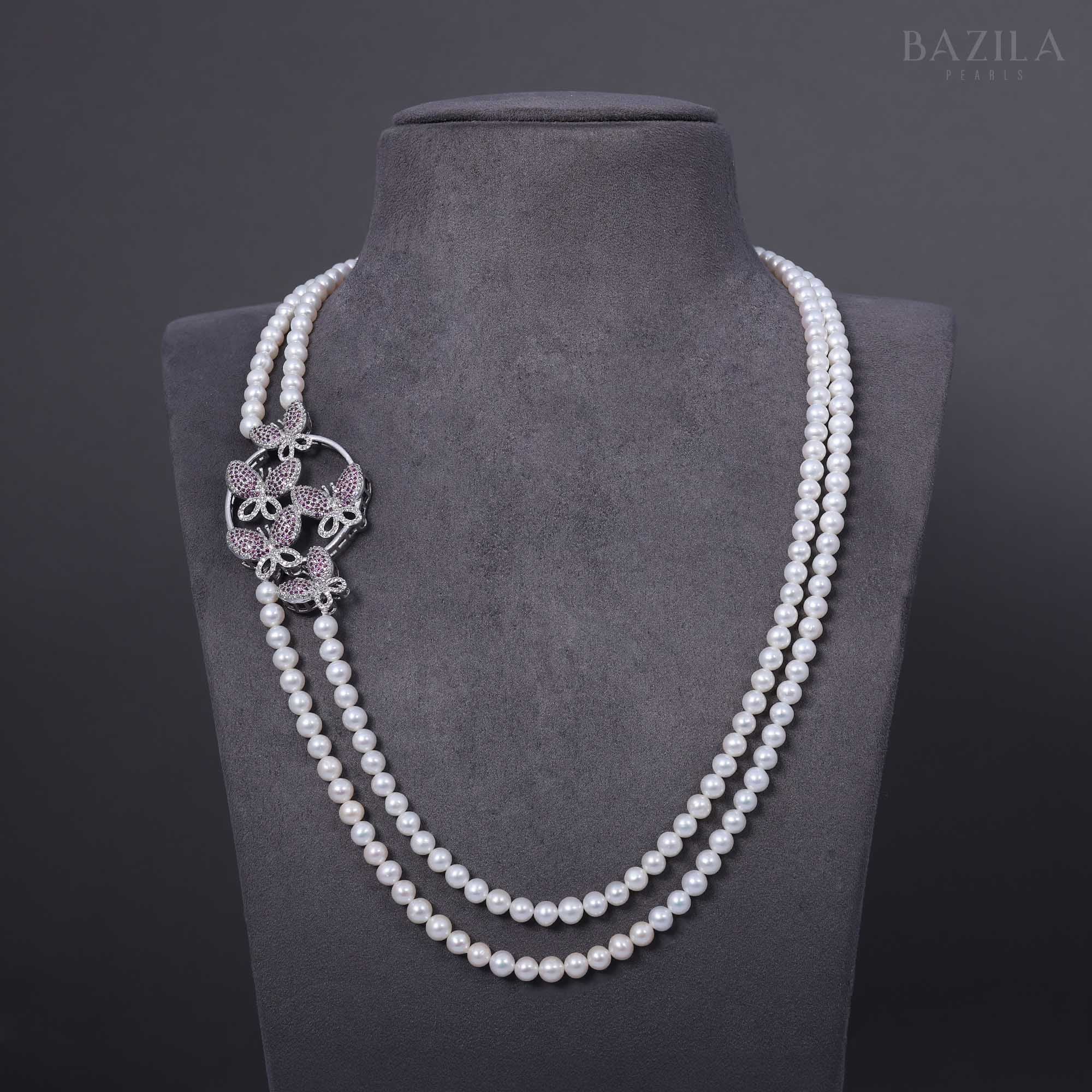 Graceful Pearl Necklace with Butterfly Zircon Motif