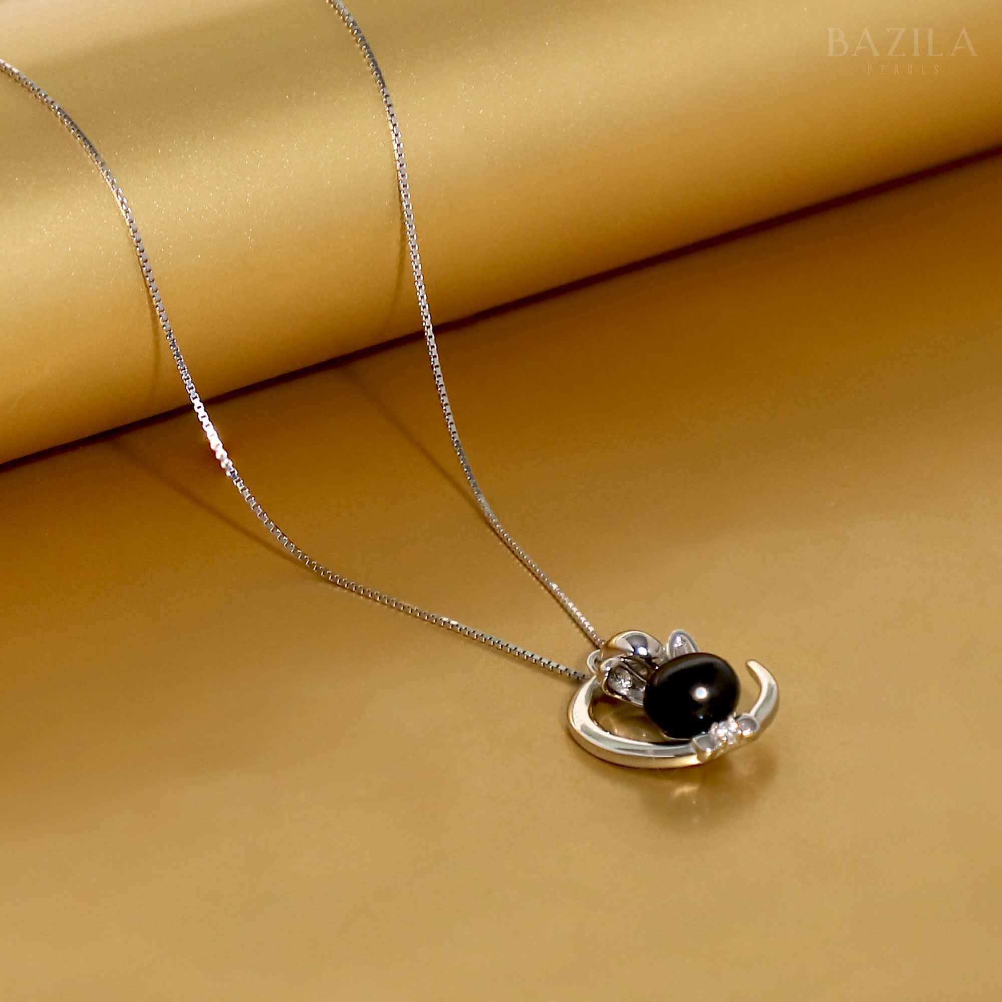Timeless Duo: Black & White Pearl Pendant in Gold