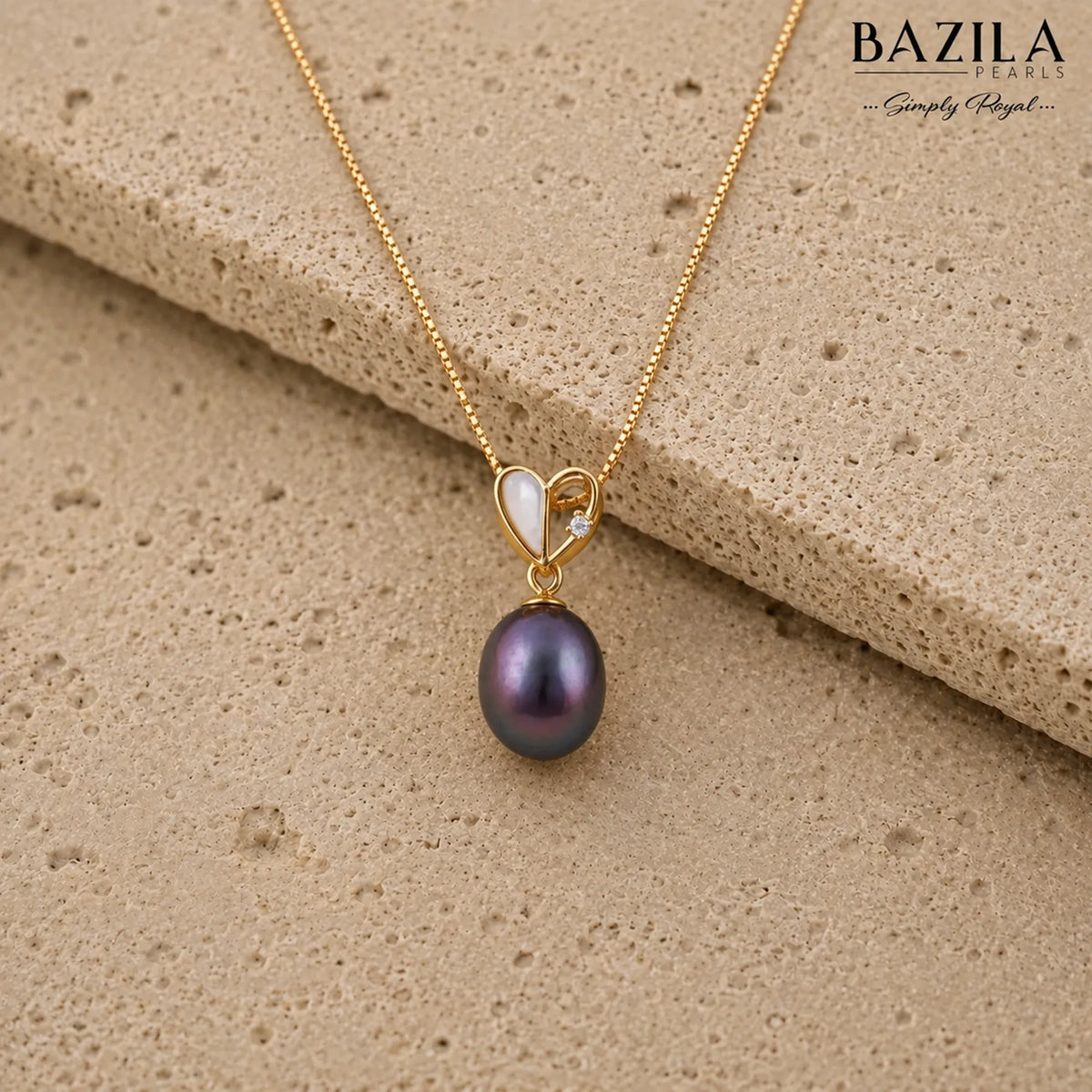 Lustrous Black Pearl Pendant on Gleaming Gold-Finish Chain