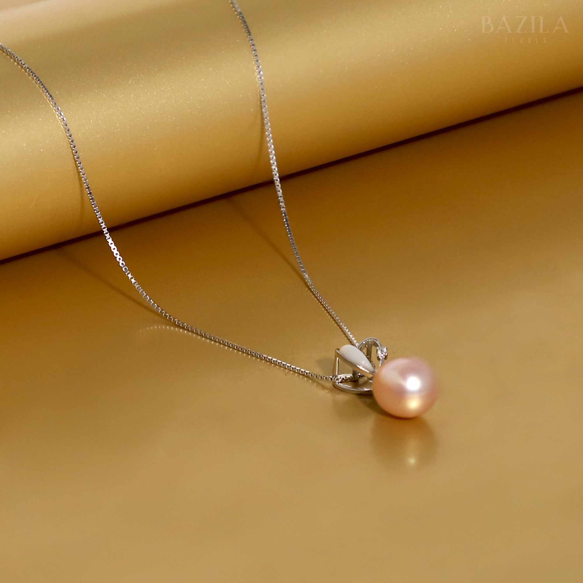 Delicate Pink Pearl Pendant with Sleek Silver Chain