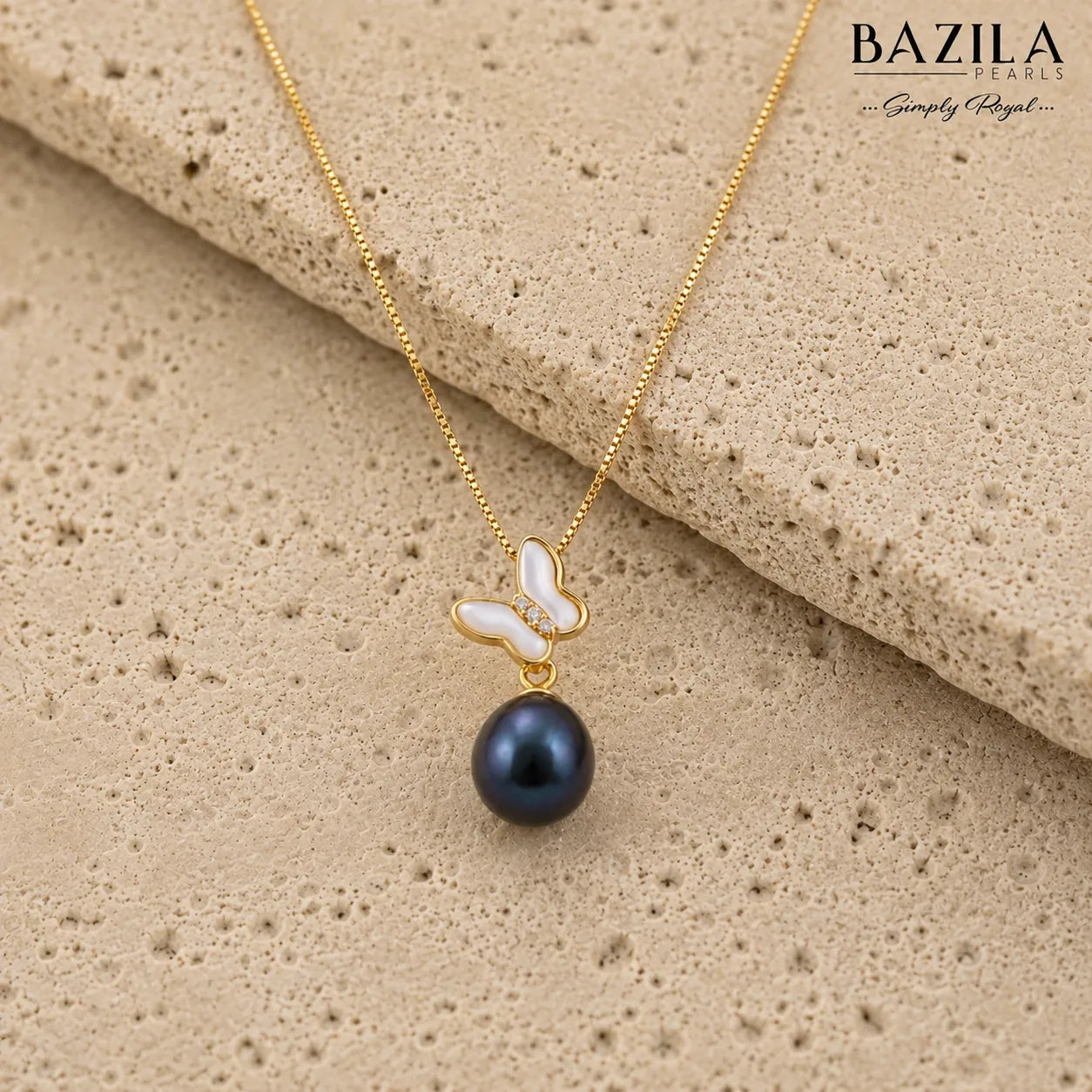 Butterfly-Inspired Black Pearl Pendant on Gold-Toned Chain