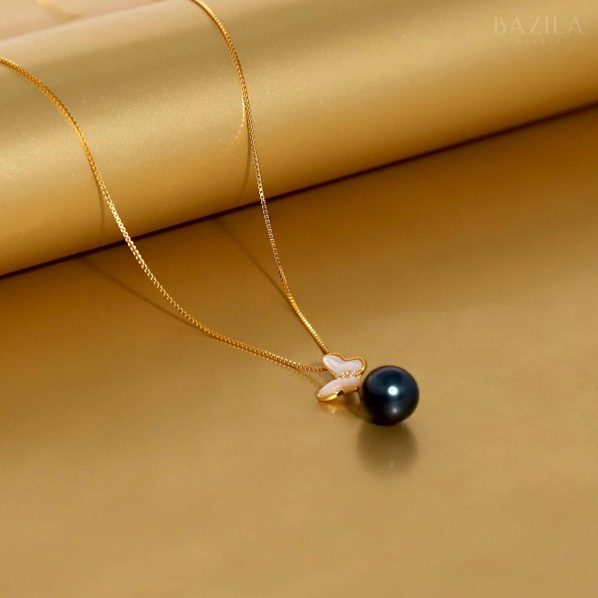 Butterfly-Inspired Black Pearl Pendant on Gold-Toned Chain