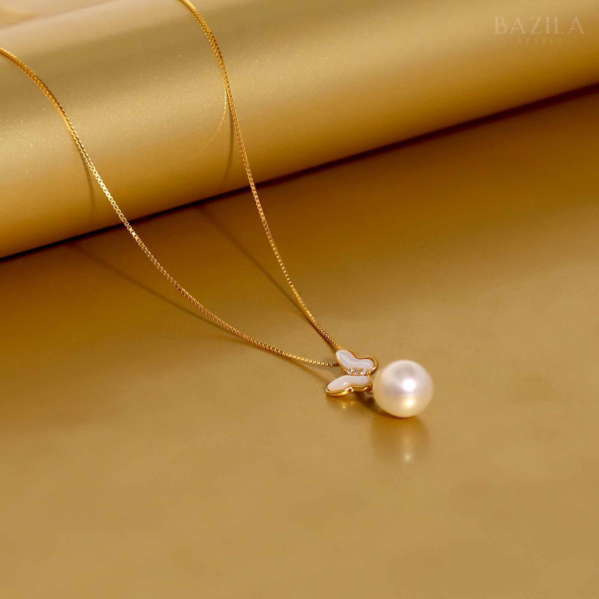 Butterfly-Inspired White Pearl Pendant on Gold Chain