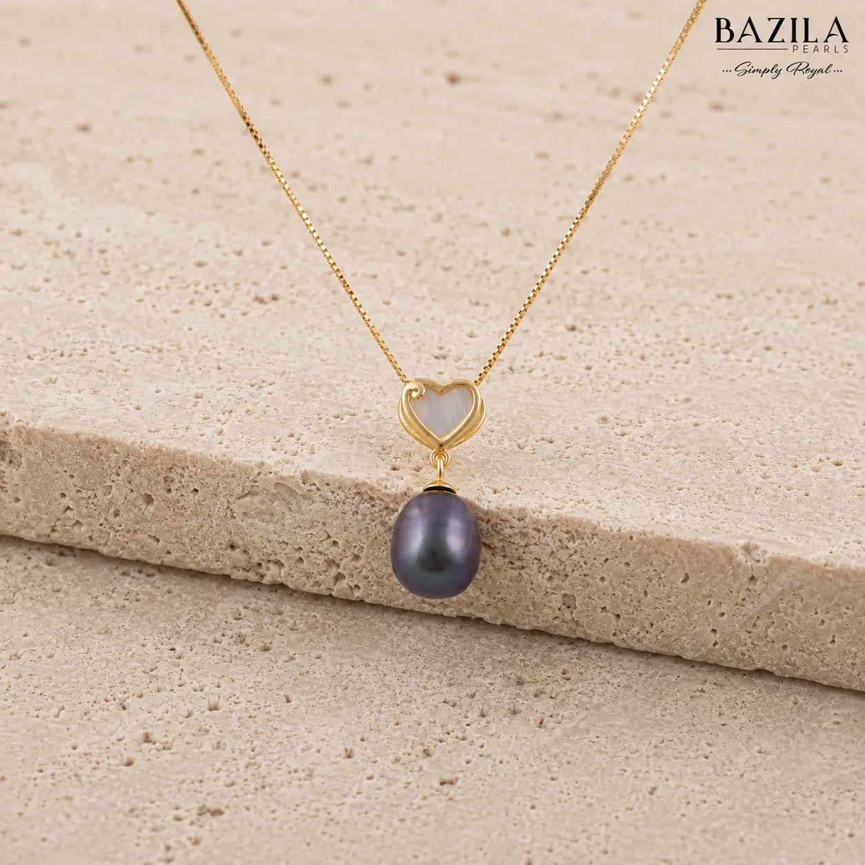 Black Drop Pearl Pendant with Golden Heart Detail