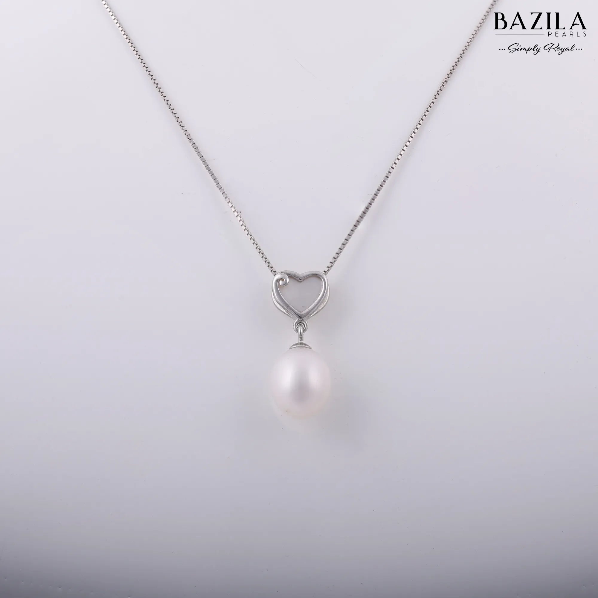 White Drop Pearl Pendant with Heart-Shaped Silver Detail