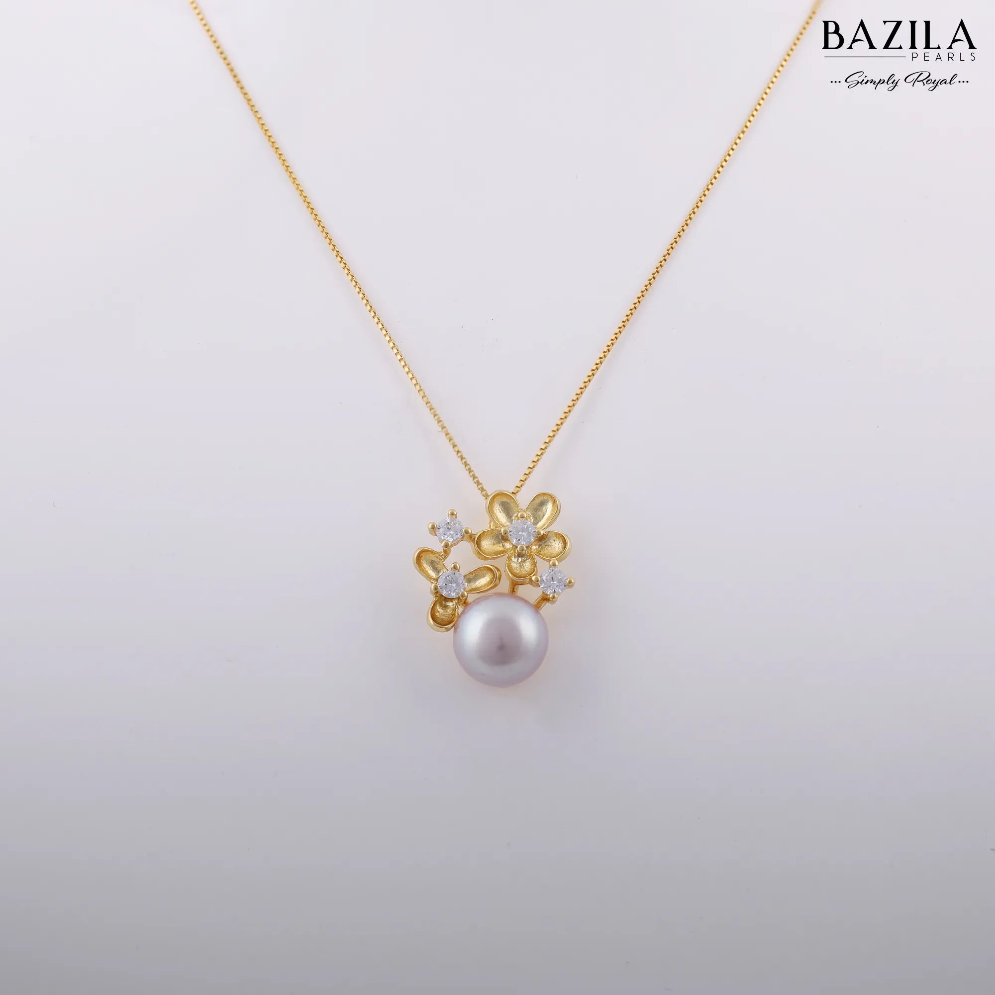 Pink Button Pearl Pendant with Gold Floral Crystal Accent