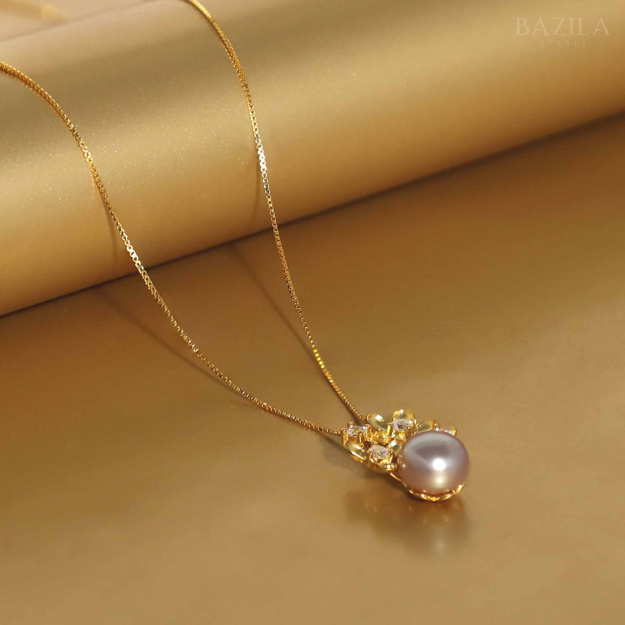 Pink Button Pearl Pendant with Gold Floral Crystal Accent