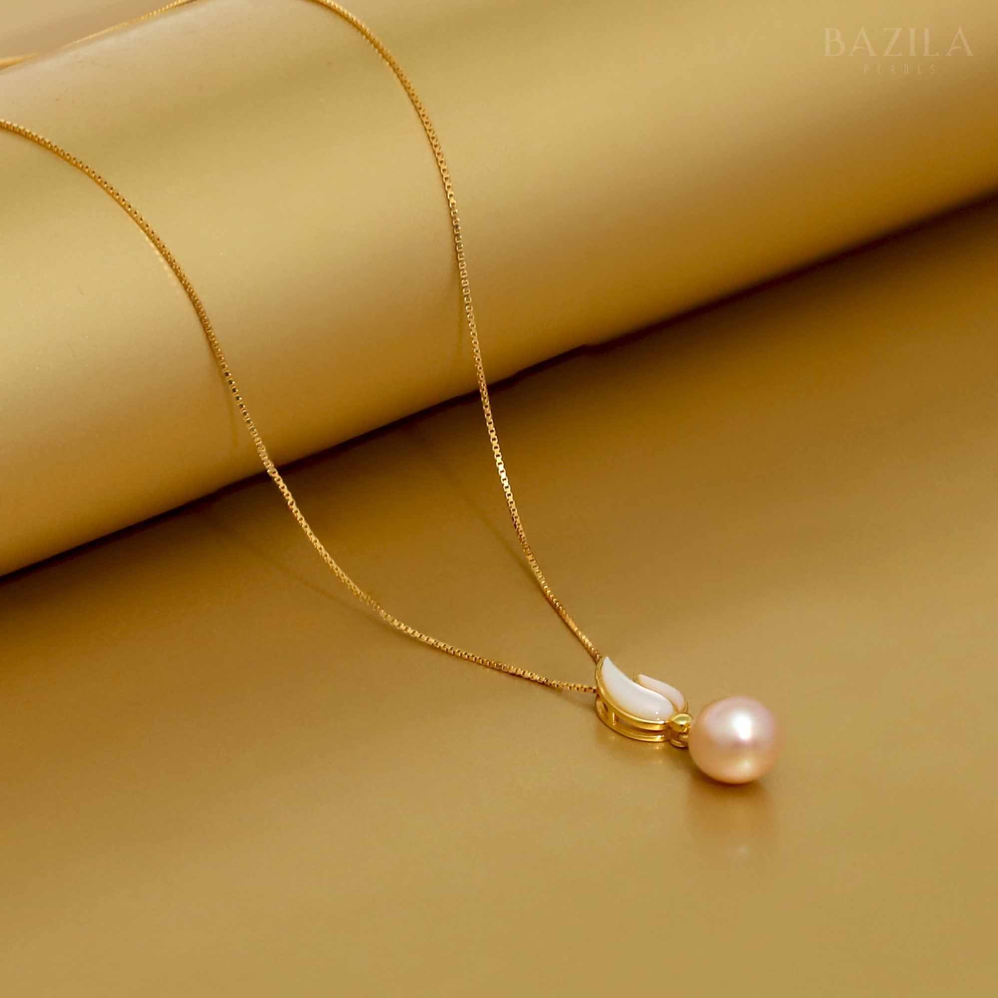 White Drop Pearl Pendant on a Blush Pink Gold Chain