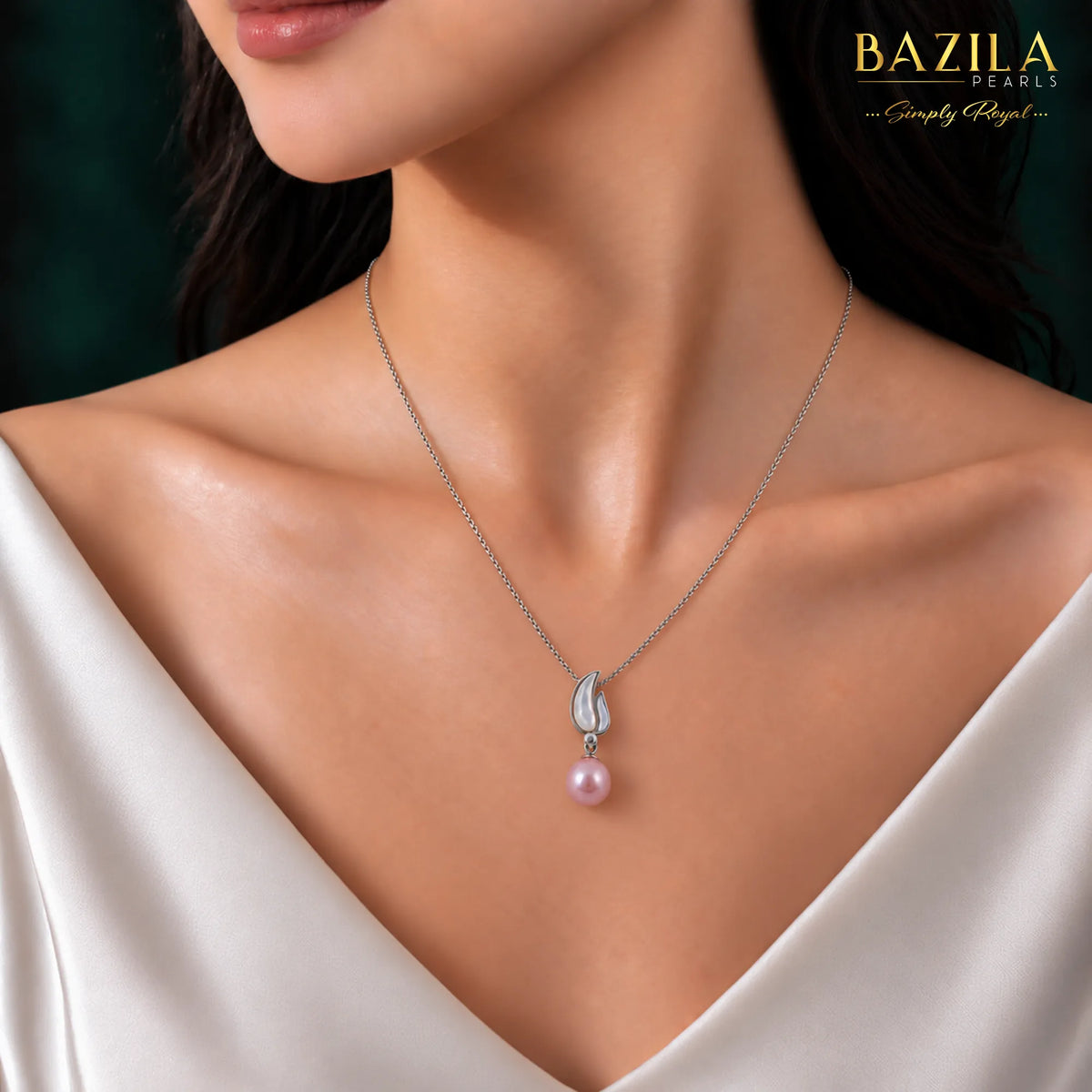 Delicate Pink Pearl Pendant in a Silver Tulip Petal Setting