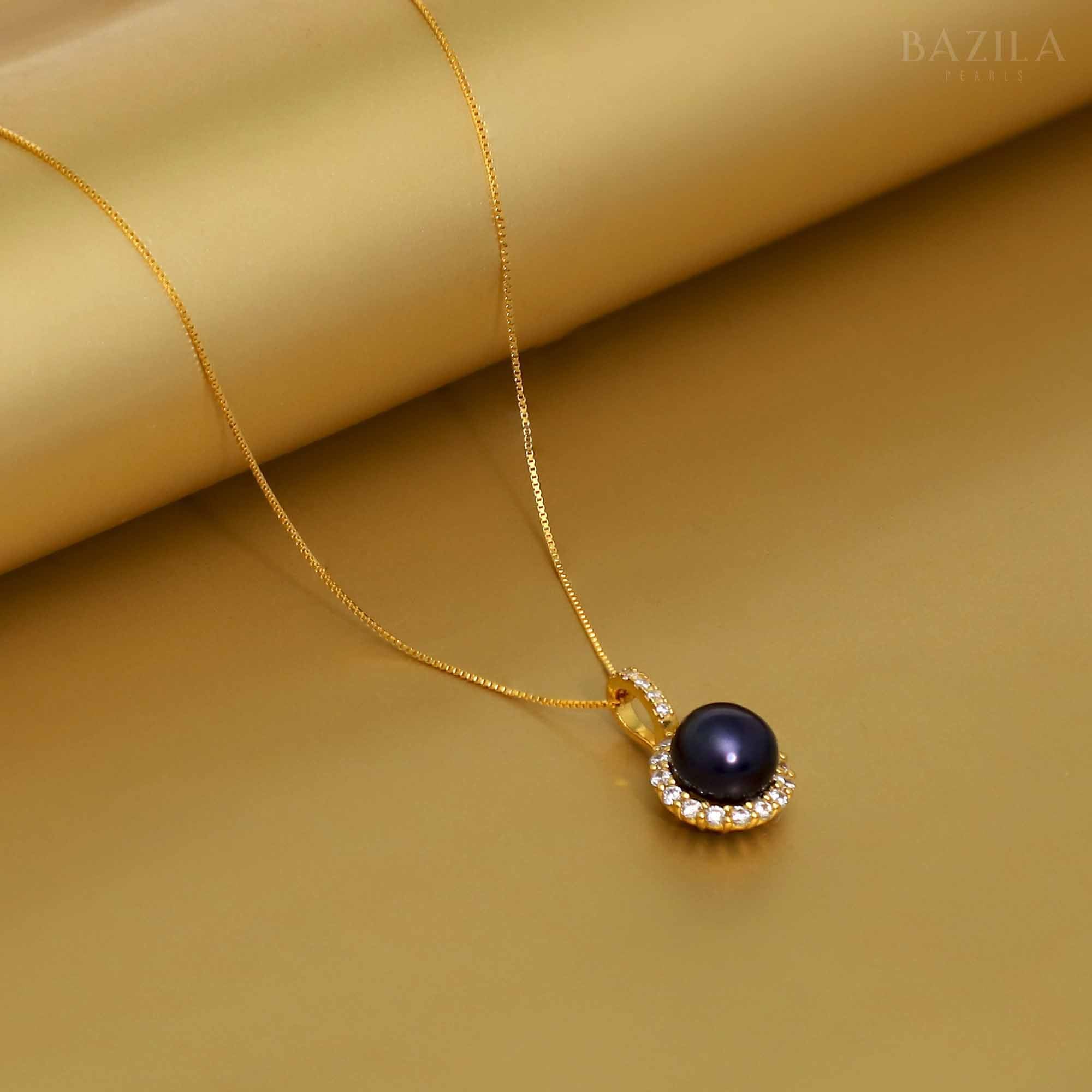 Dusky Elegance: Gold Chain, Black Pearl
