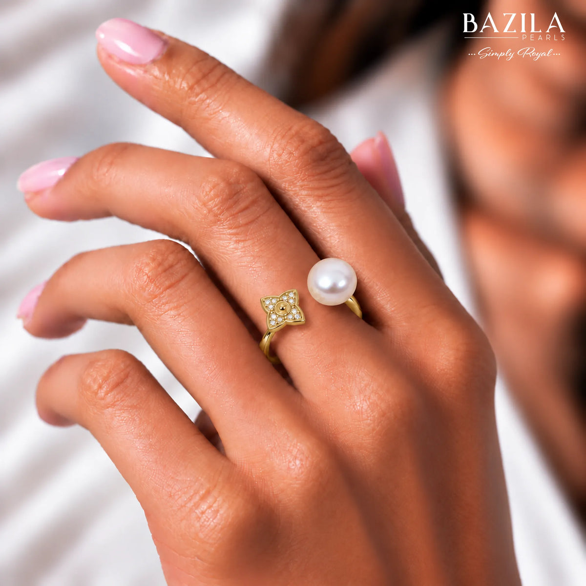 Golden Ring with Safed Moti & Chamakte Phool Design