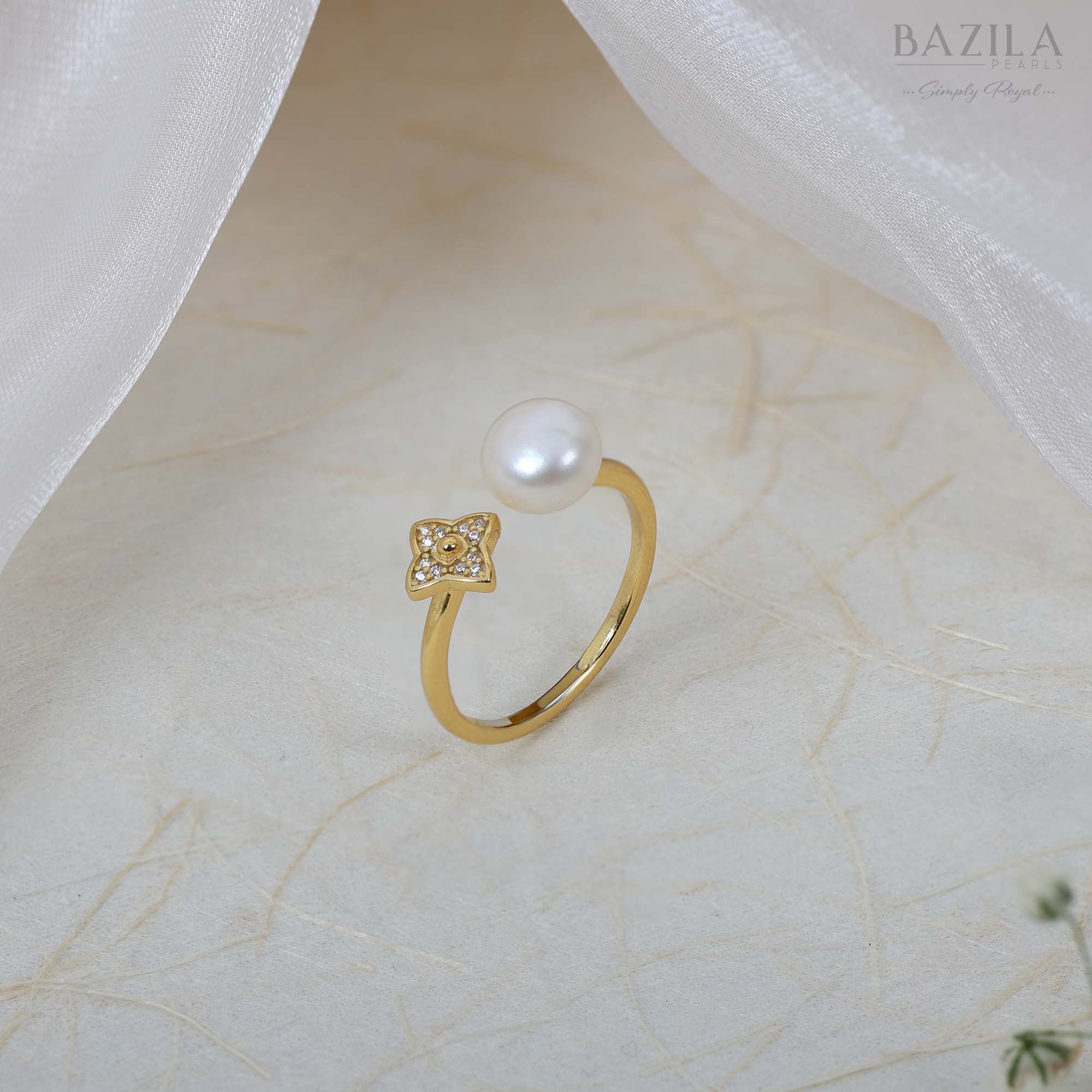 Golden Ring with Safed Moti & Chamakte Phool Design