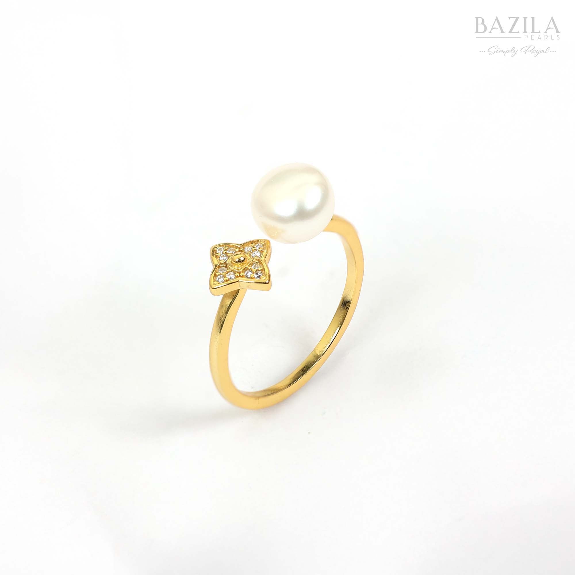Golden Ring with Safed Moti & Chamakte Phool Design
