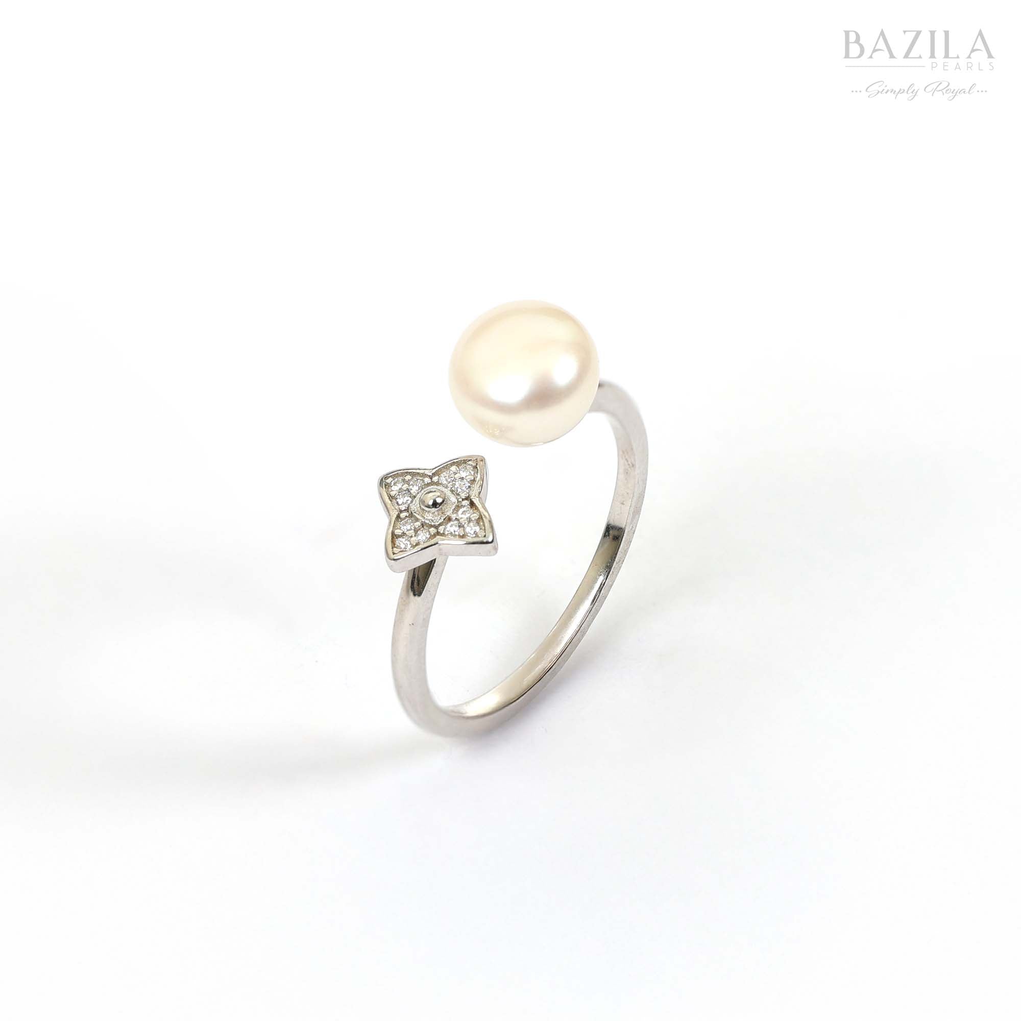 White Pearl Ring with Silver Finish and Floral Accent