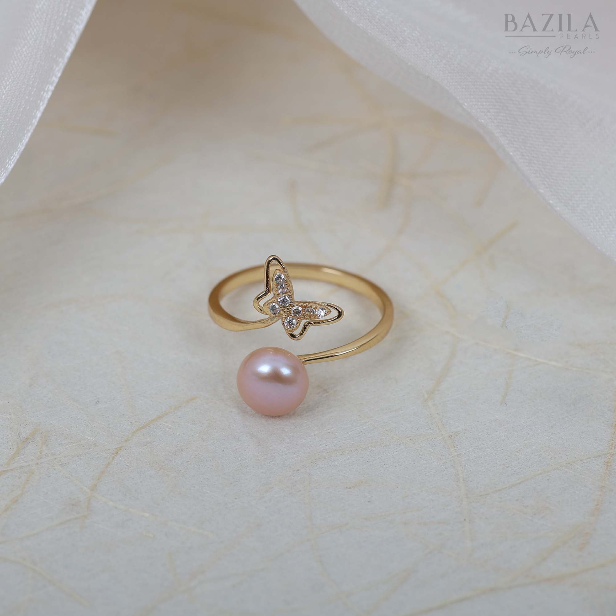 Gold Ring with Pink Pearl and Butterfly Charm