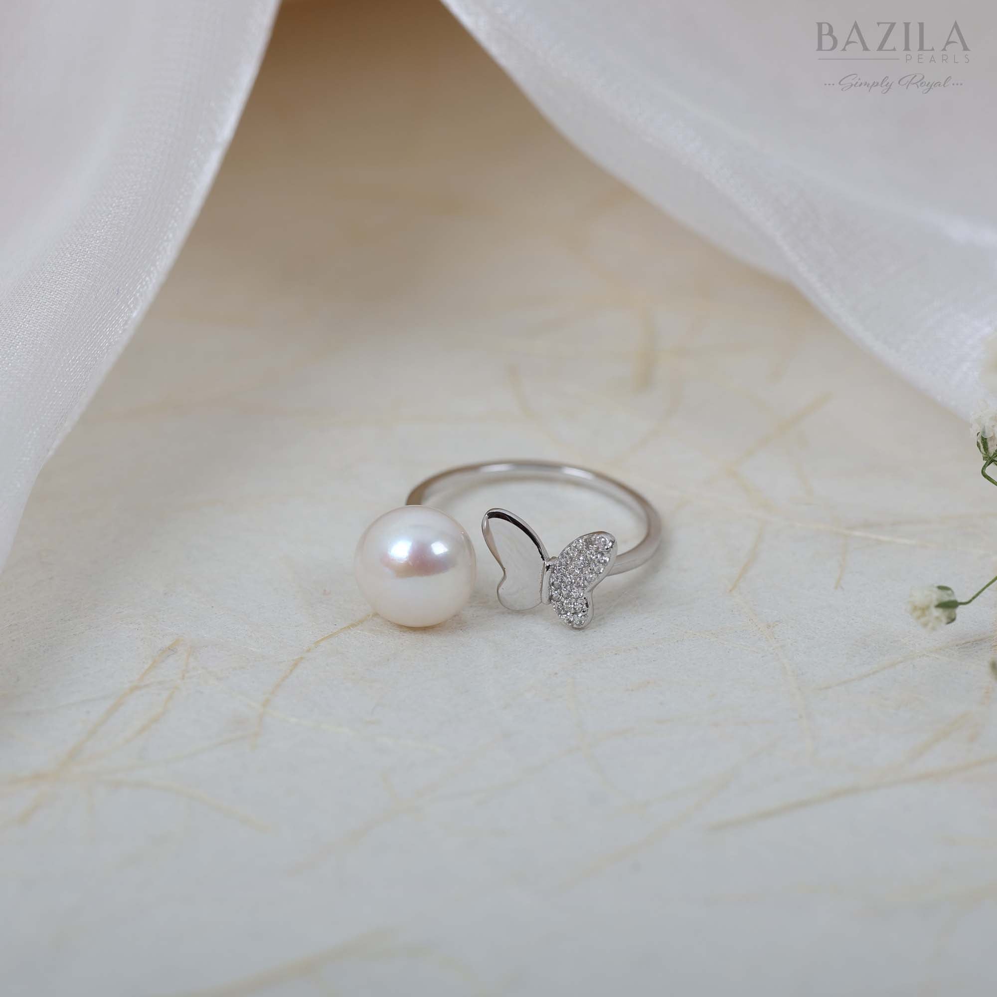 White Pearl Ring with Silver Butterfly Touch