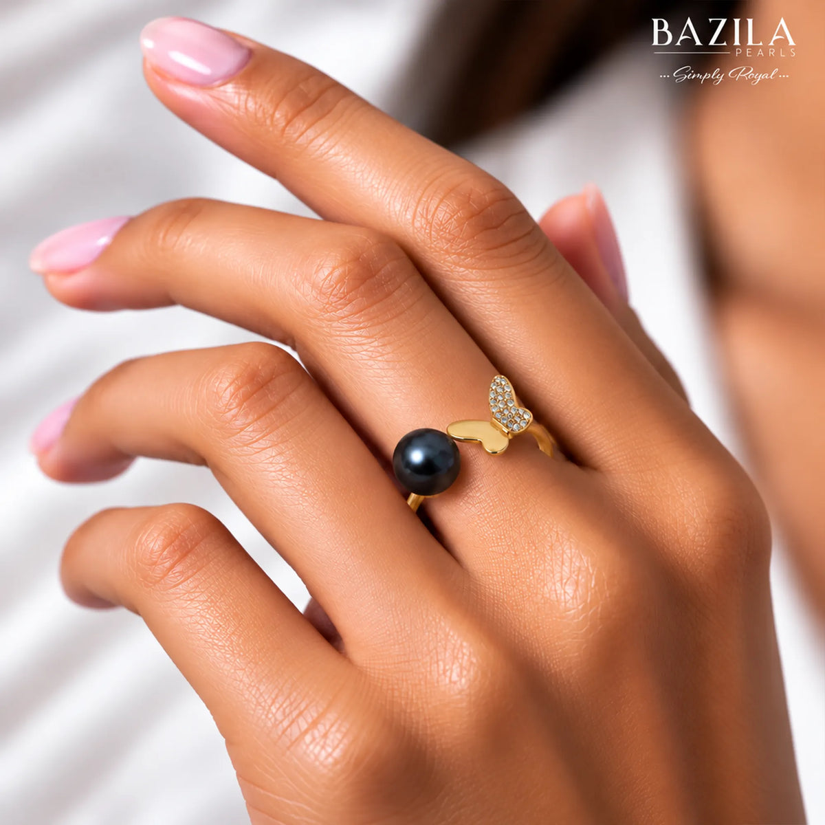 Black Pearl Ring with Gold Butterfly Accent