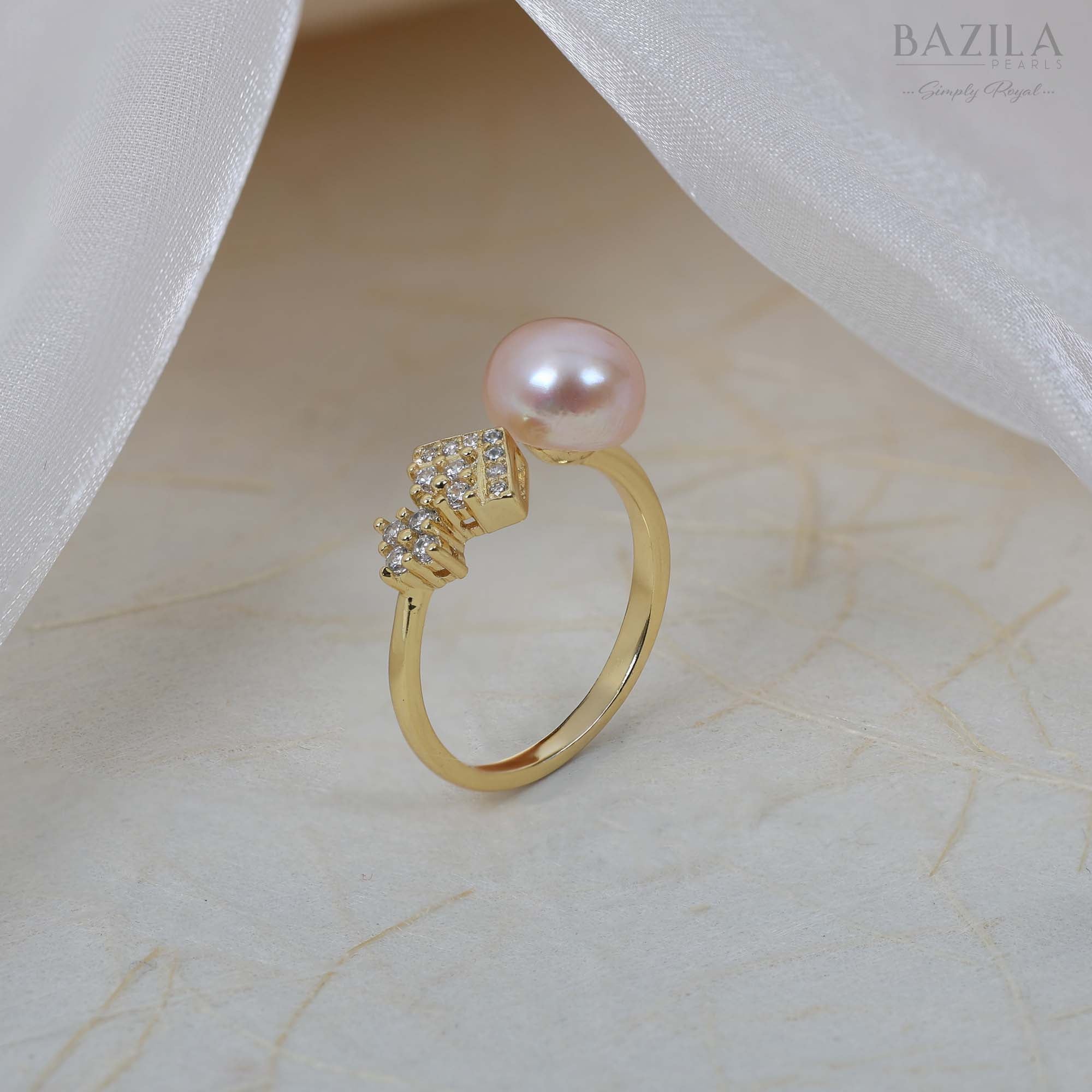 Gold Ring with Pink Pearl and Diamond Cluster Detail