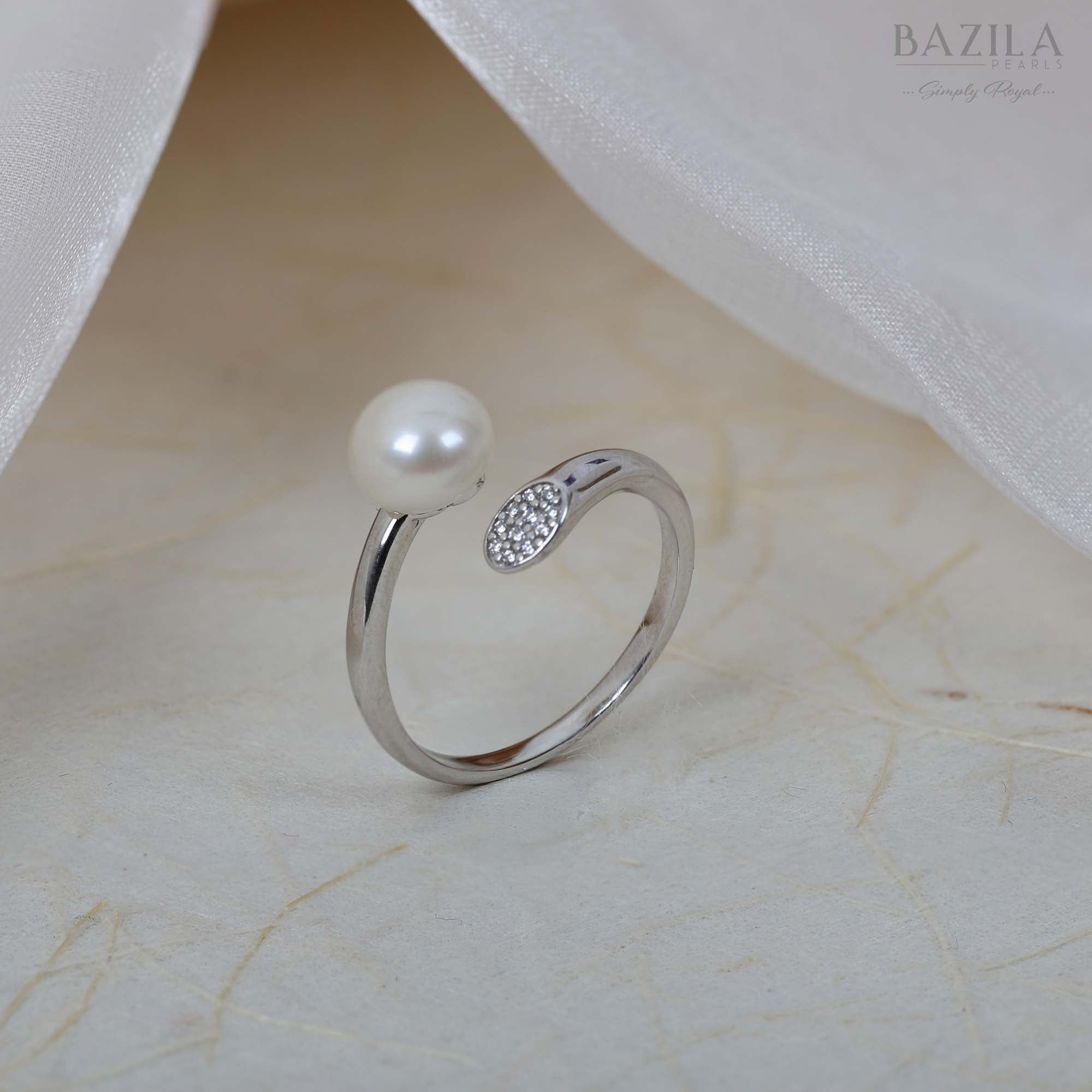 White Pearl Ring with Sparkling Oval Accent