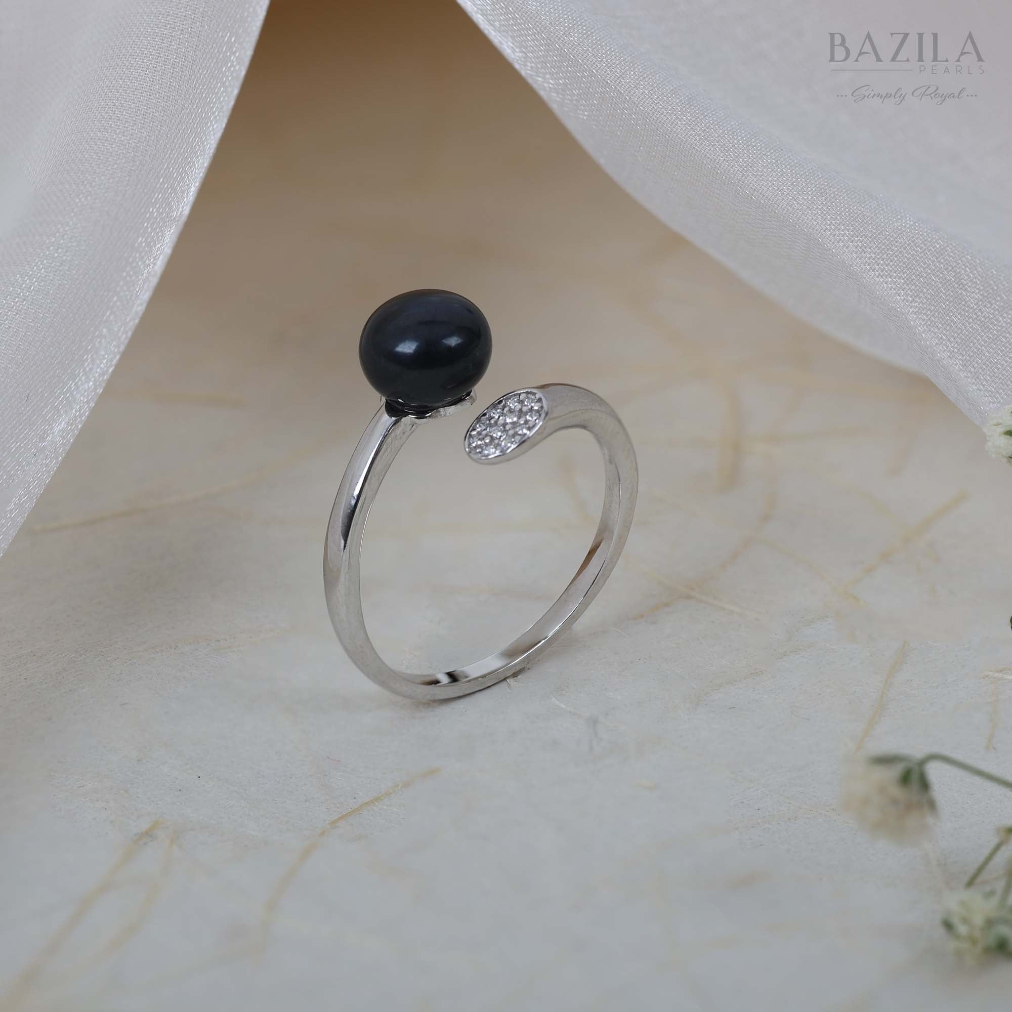 Black Pearl Ring with Silver Sparkling Oval Tip