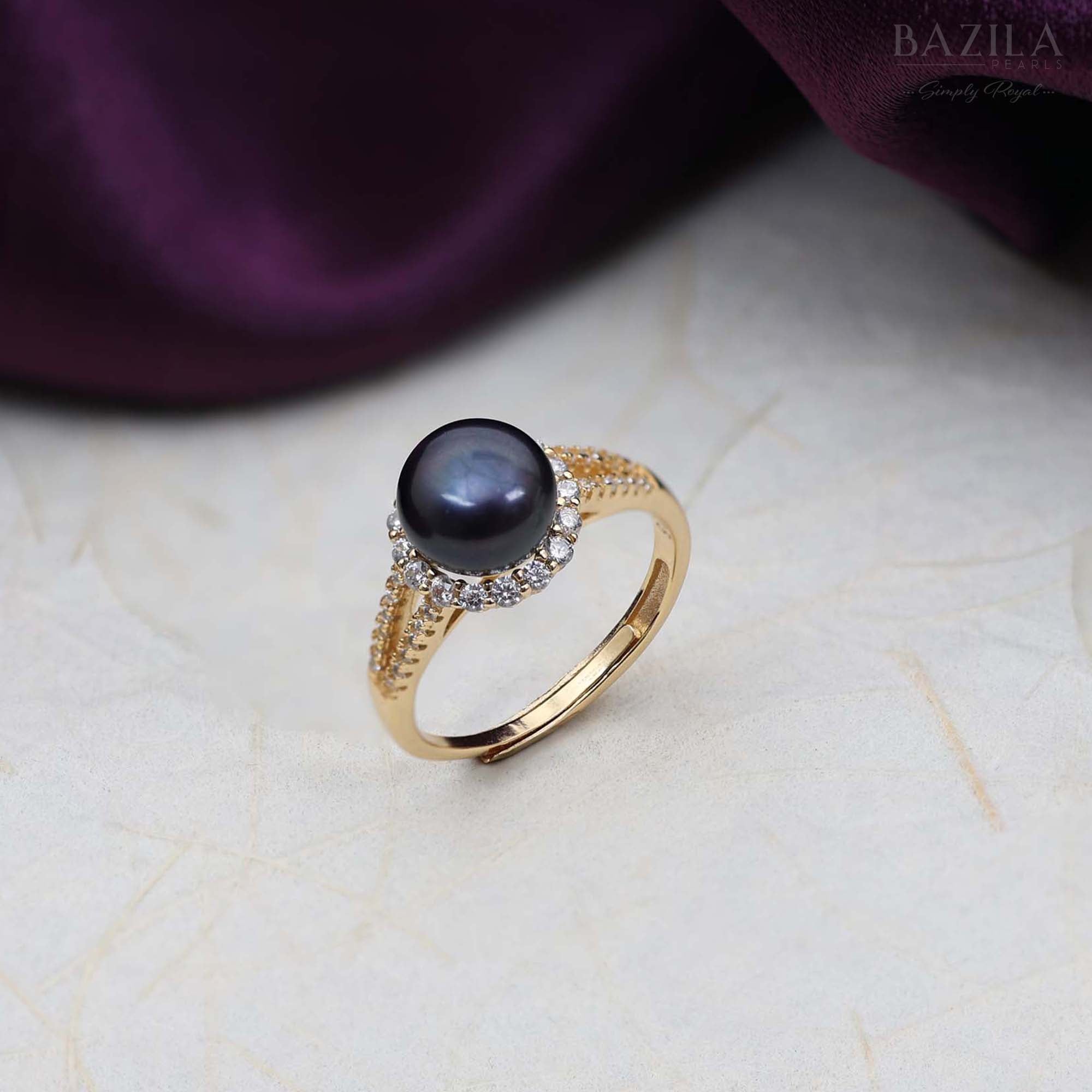 Gold Halo Ring with Black Pearl and Sparkling Accents