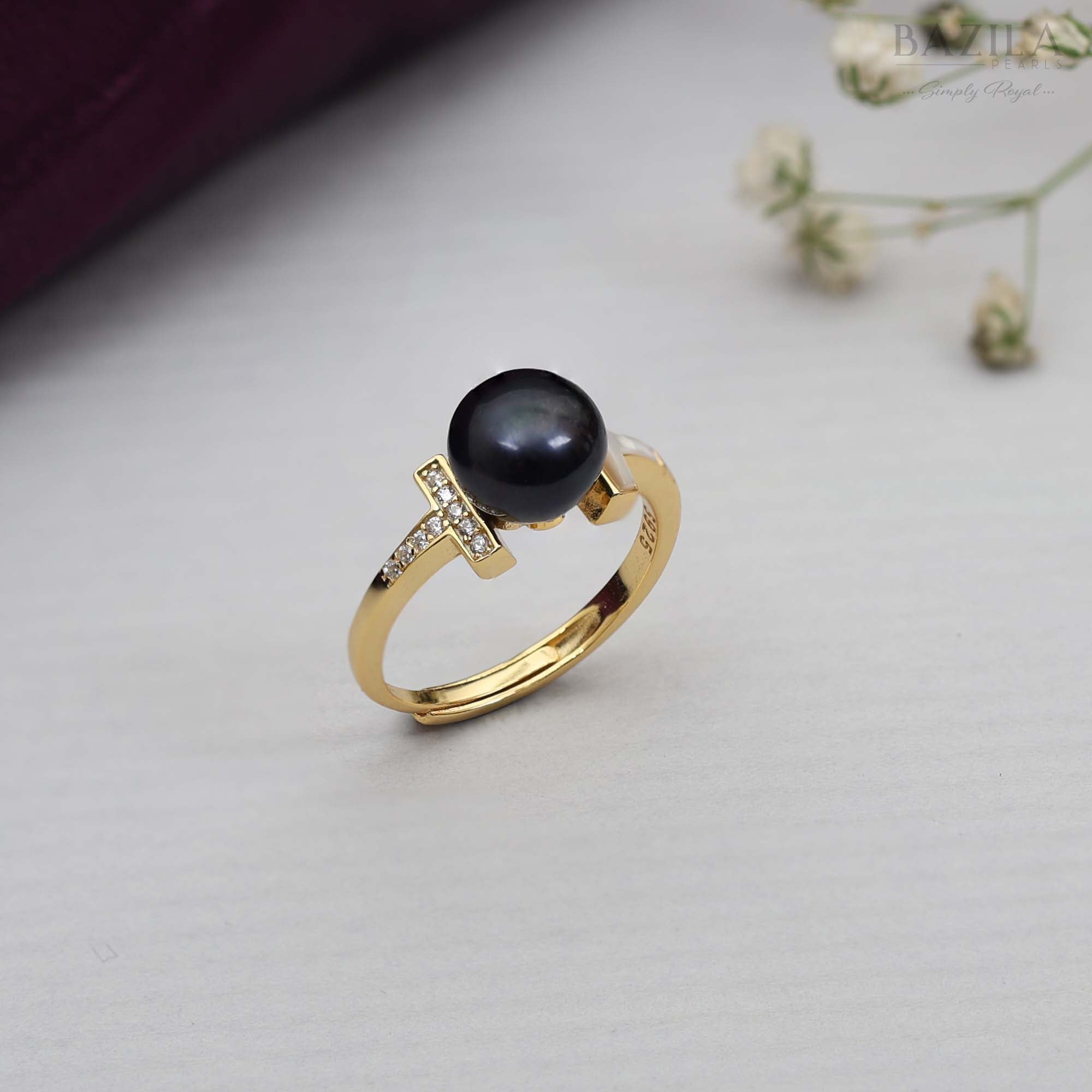 Gold Ring with Black Pearl & Shining T Design