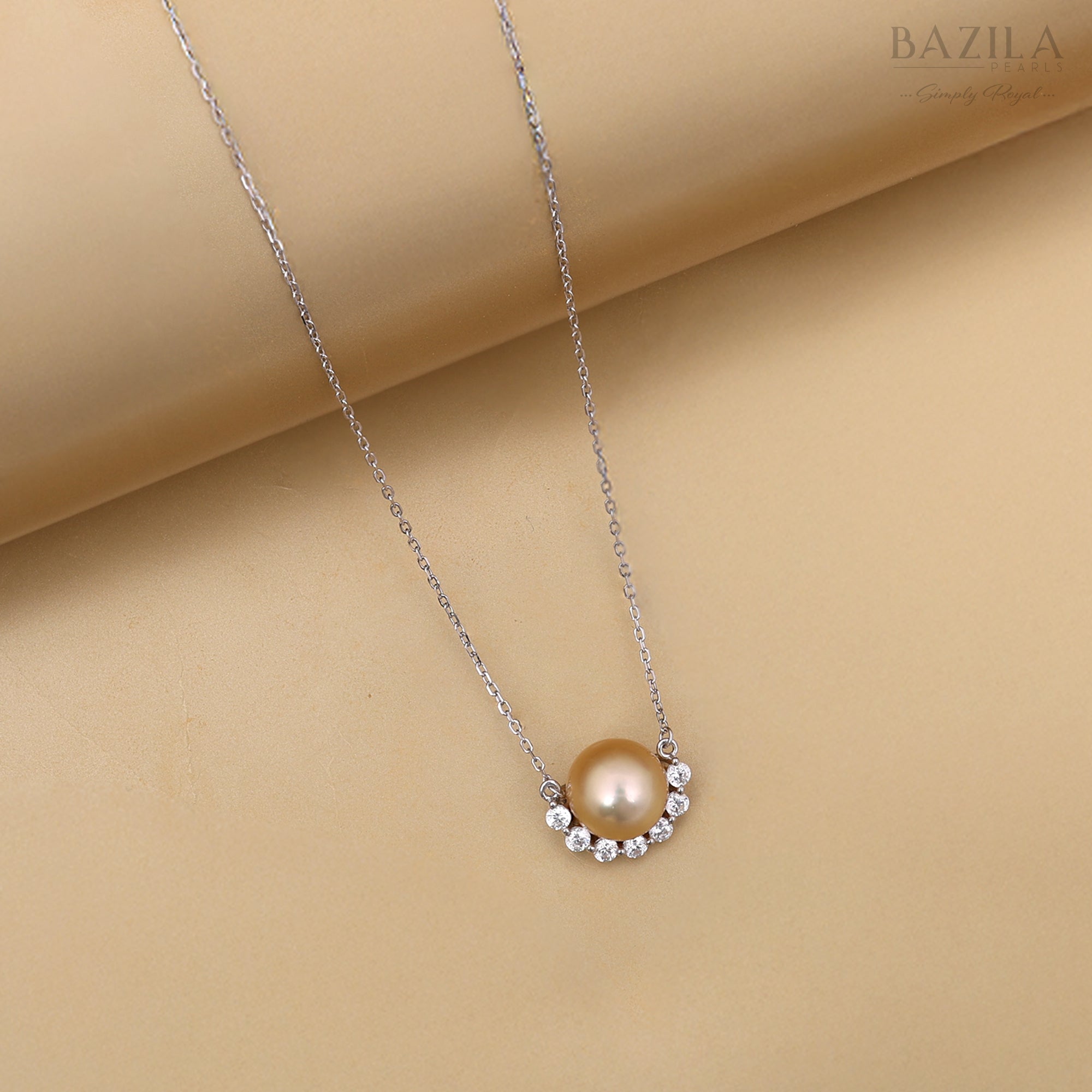 Elegant South Sea Cultured Pearl Pendant in Silver with Sparkling Stone Halo
