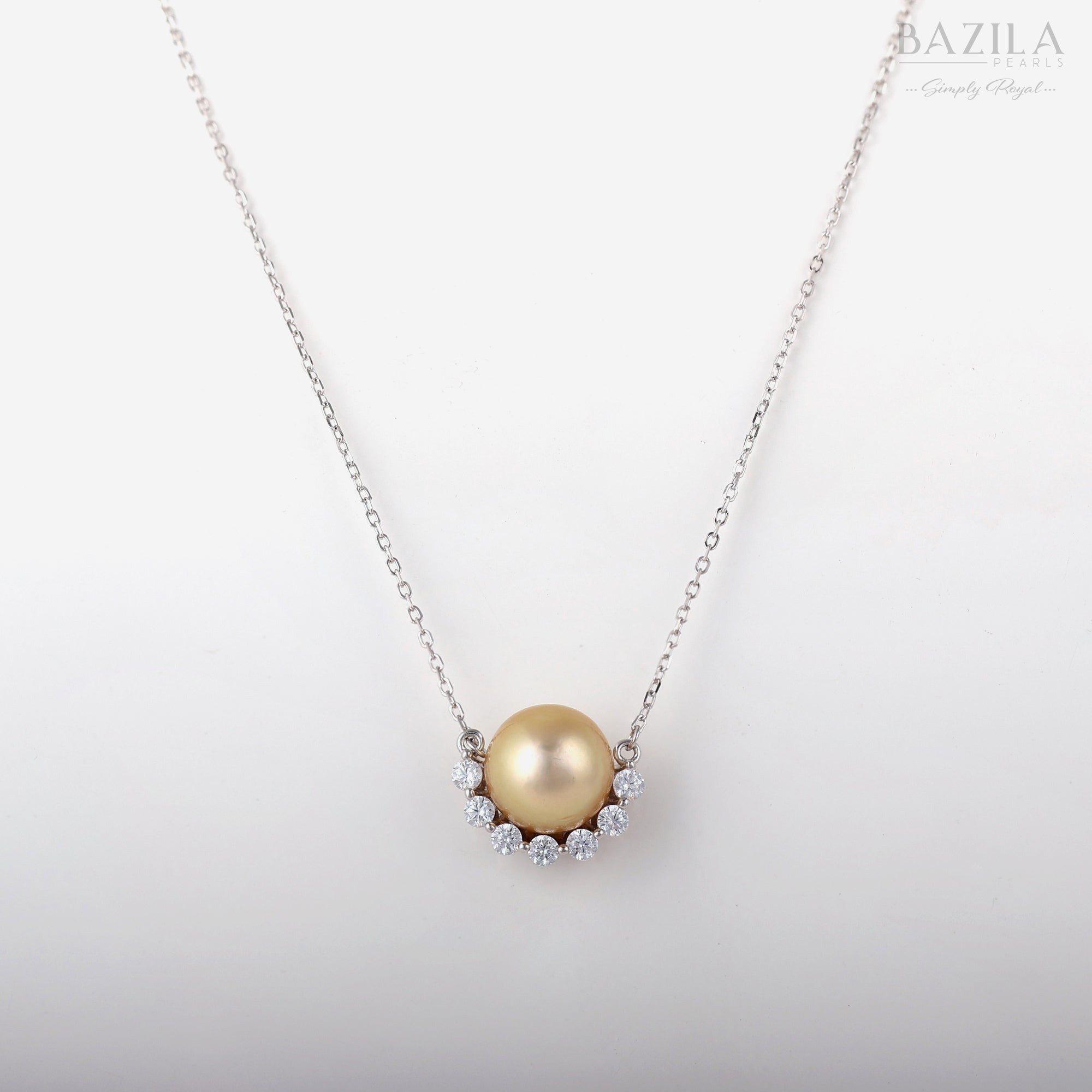 Elegant South Sea Cultured Pearl Pendant in Silver with Sparkling Stone Halo