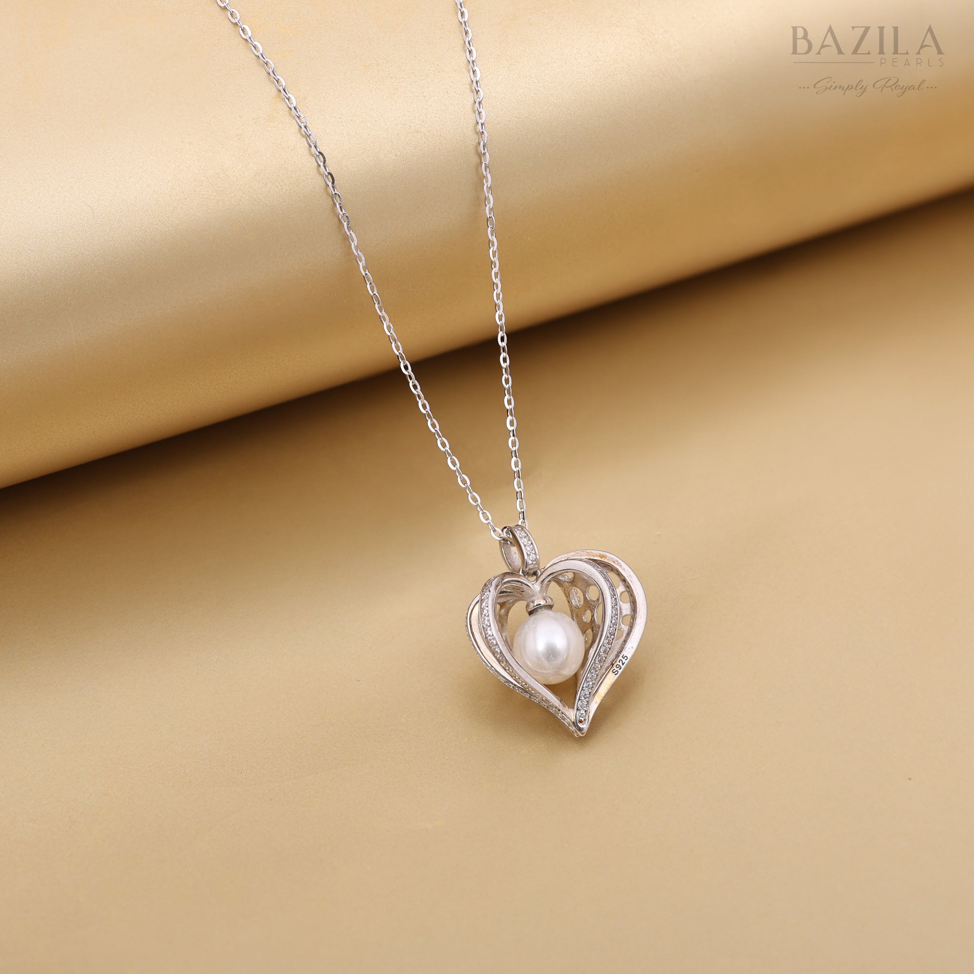 Radiant Sea Pearl Heart Pendant in Sterling Silver with Dazzling Crystal Accents