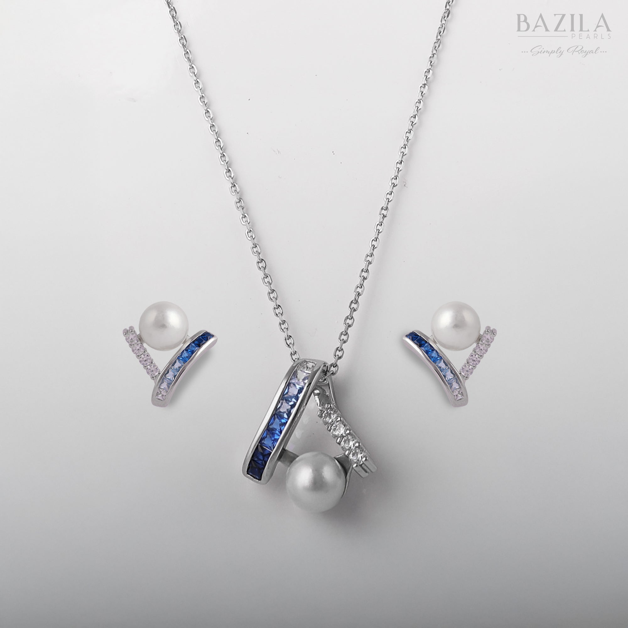 Elegant Akoya Cultured Pearl Pendant and Earring Set in Sterling Silver with Blue Sapphire Accents