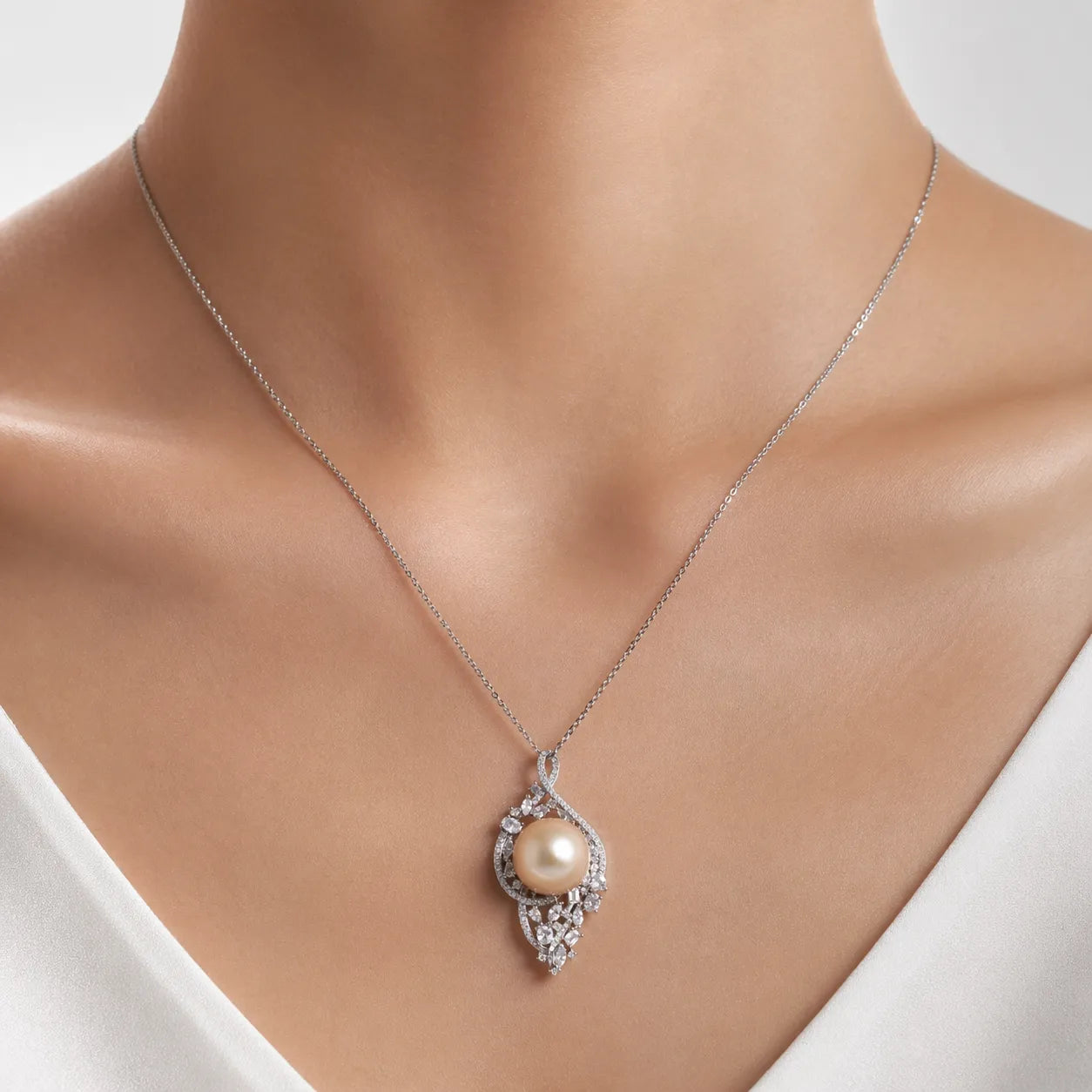 Golden Elegance: South Sea Pearl & Zircon Pendant