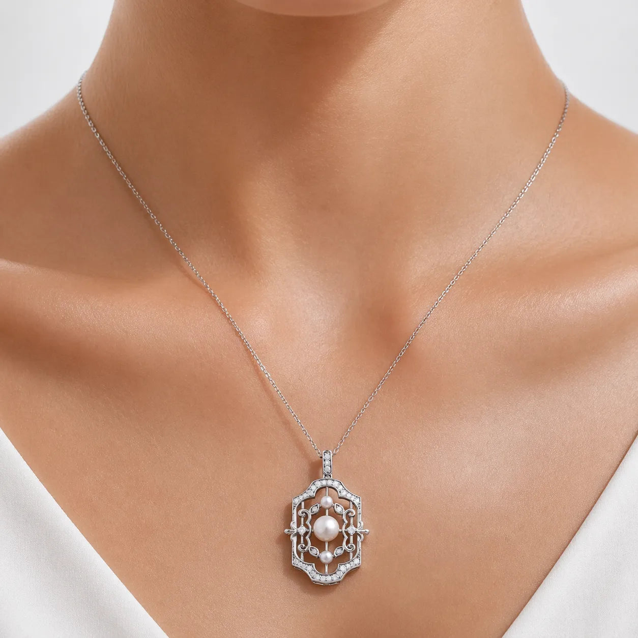 Ethereal Grace: Freshwater Pearl & Zircon Pendant