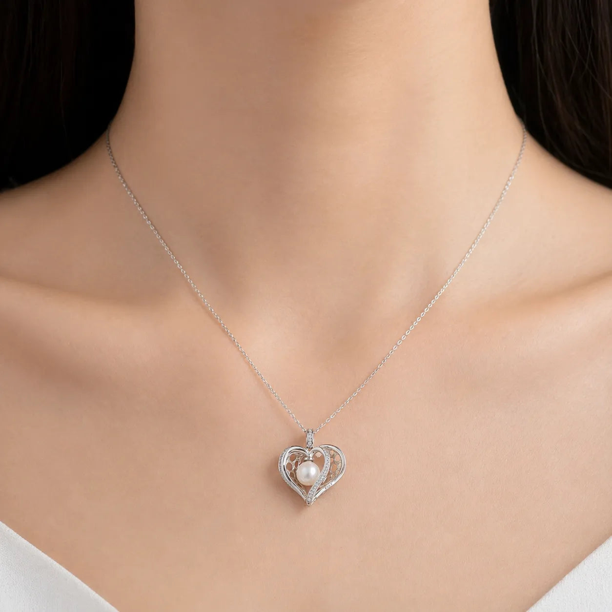 Radiant Sea Pearl Heart Pendant in Sterling Silver with Dazzling Crystal Accents