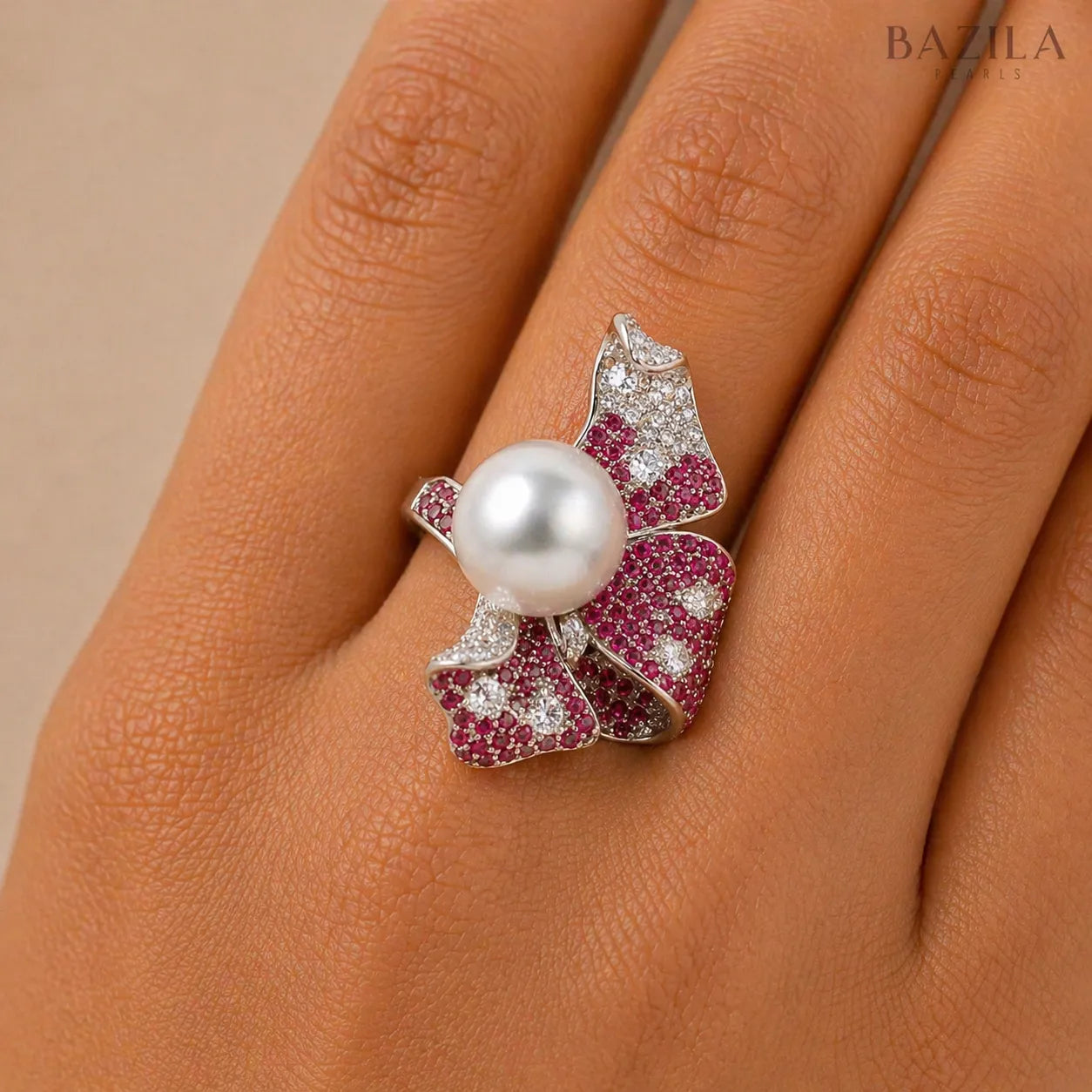 Blossom of Elegance: South Sea Pearl & Ruby Ribbon Ring